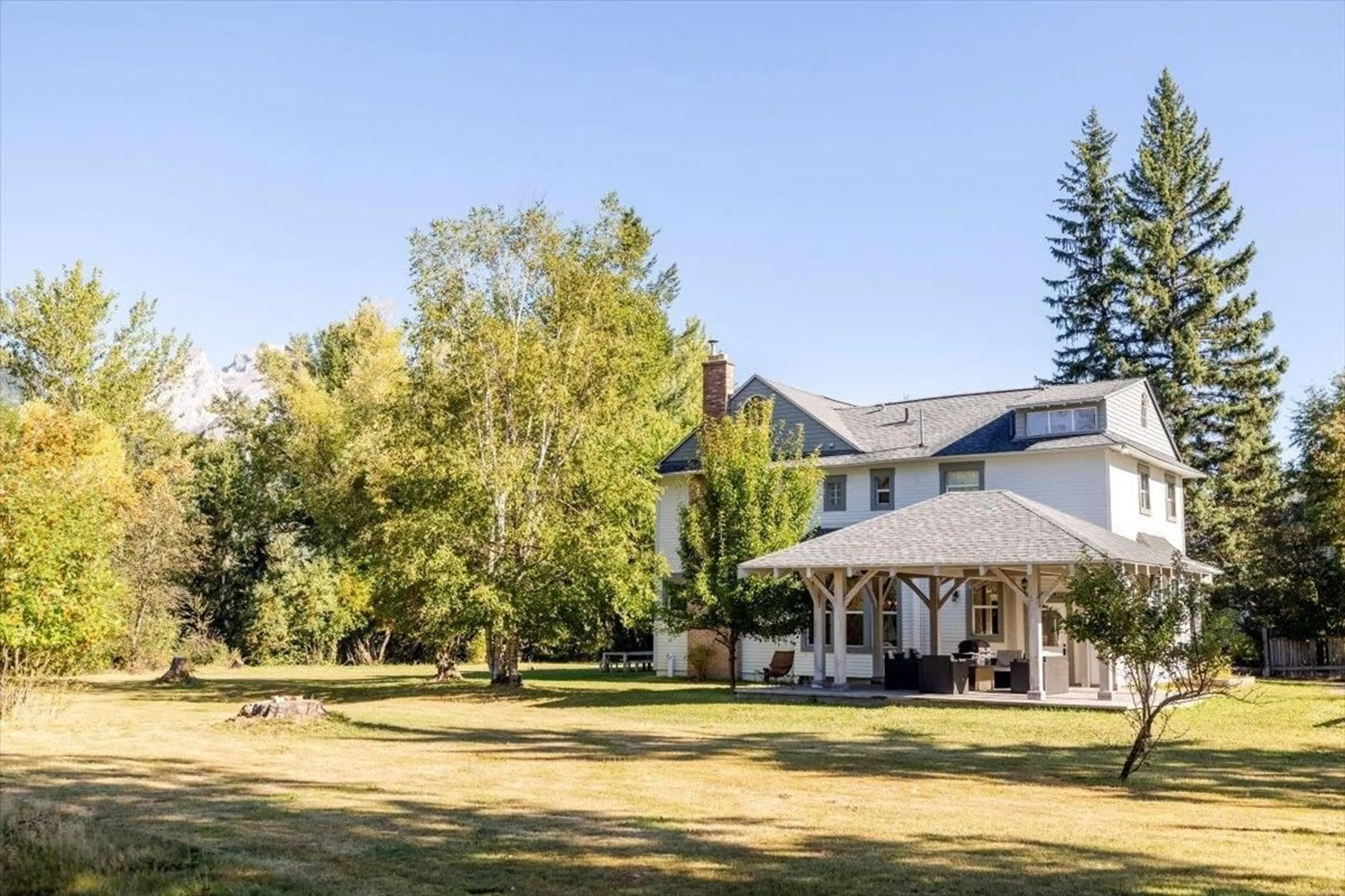 A pic from exterior of the house or condo, the fenced backyard for 9 PARK Crescent, Fernie British Columbia V0B1M0