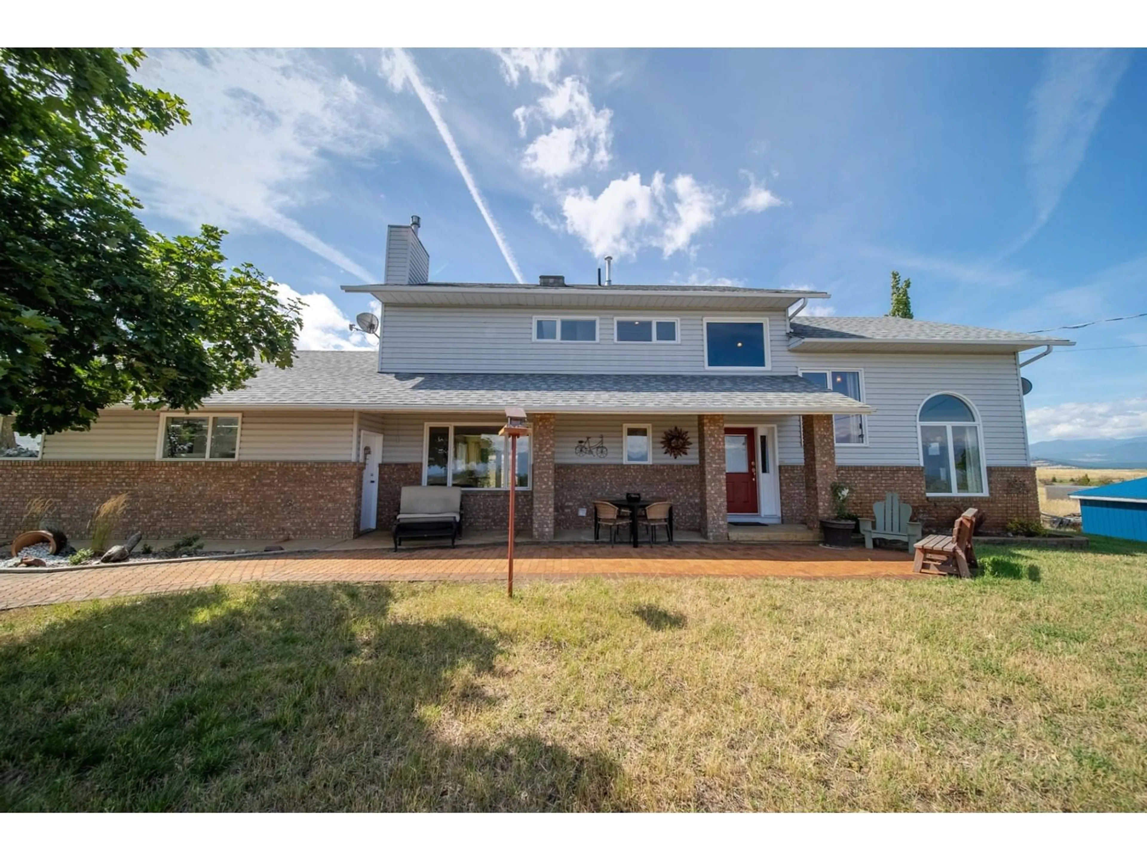 Frontside or backside of a home, the fenced backyard for 9617 CLEARVIEW Road, Cranbrook British Columbia V1C7E2