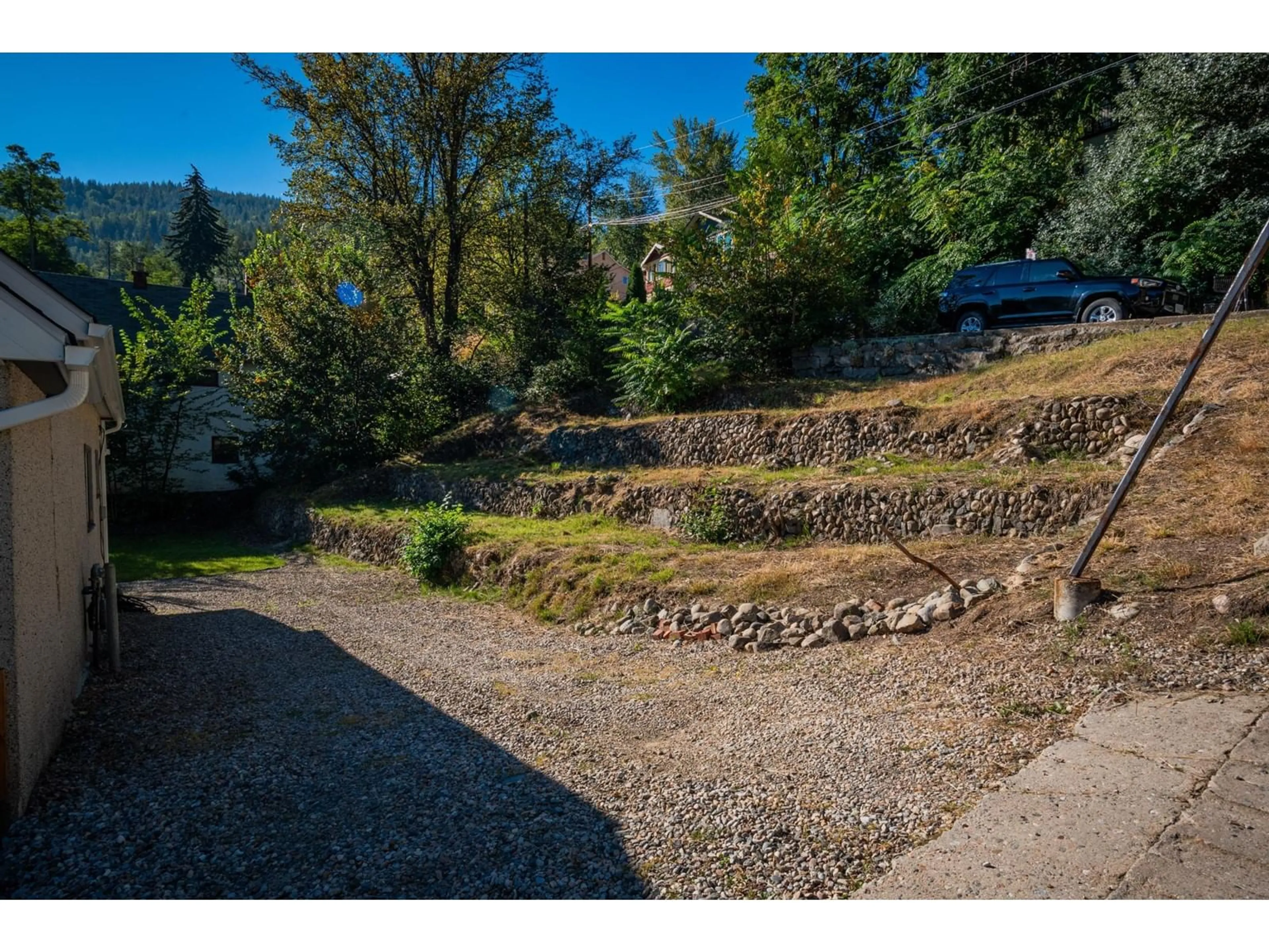 Patio, the fenced backyard for 710 SPOKANE Street, Trail British Columbia V1R3W2