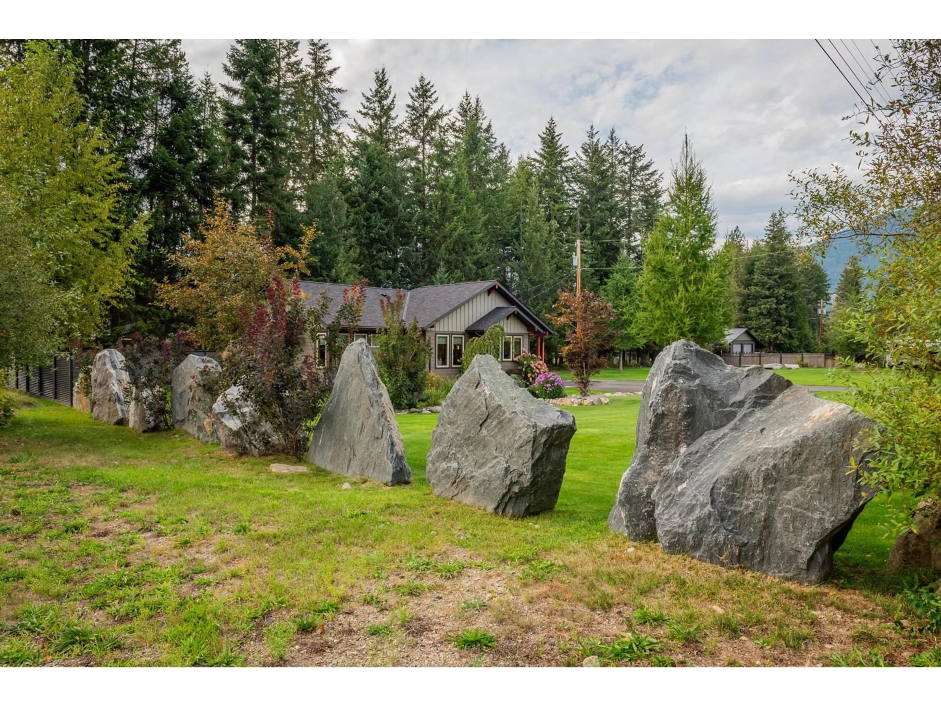 Frontside or backside of a home, the fenced backyard for 2711 JACKS Crescent, South Slocan British Columbia V1N2G1