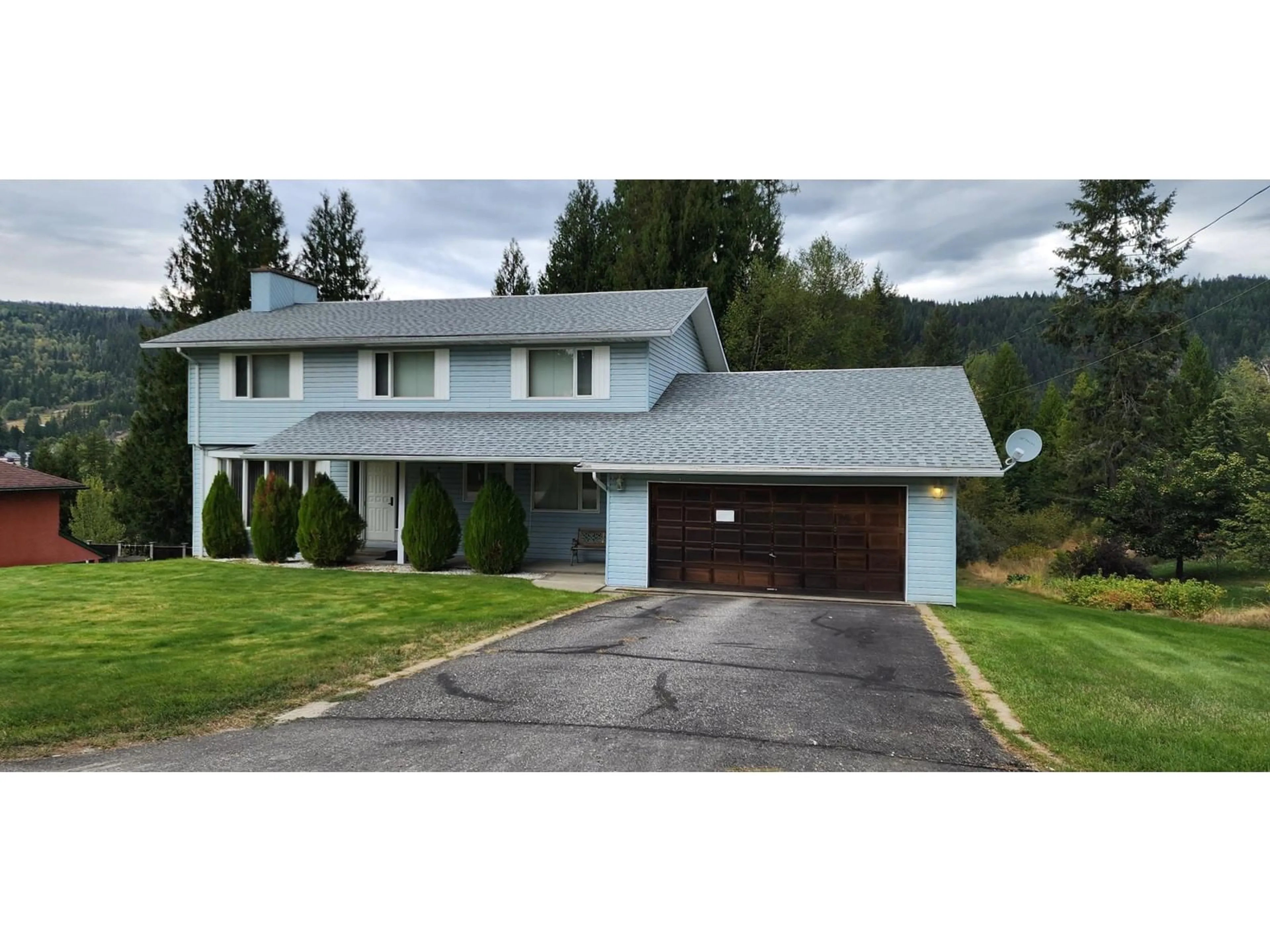 Frontside or backside of a home, cottage for 1975 OLD SALMO Road, Fruitvale British Columbia V0G1L1