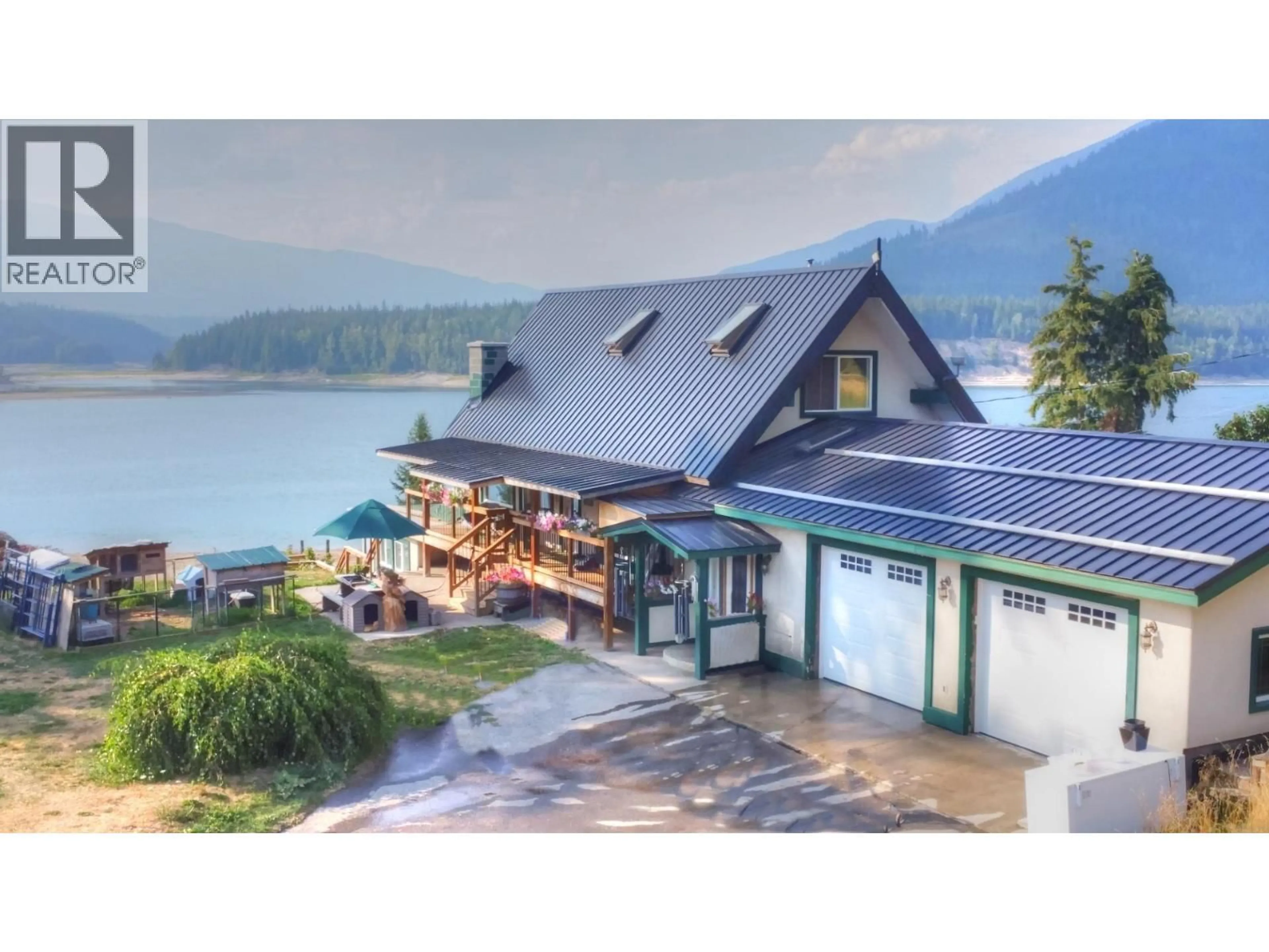 A pic from outside/outdoor area/front of a property/back of a property/a pic from drone, water/lake/river/ocean view for 4008 ARROW PARK FRONTAGE ROAD, Arrow Park British Columbia V0G1R1