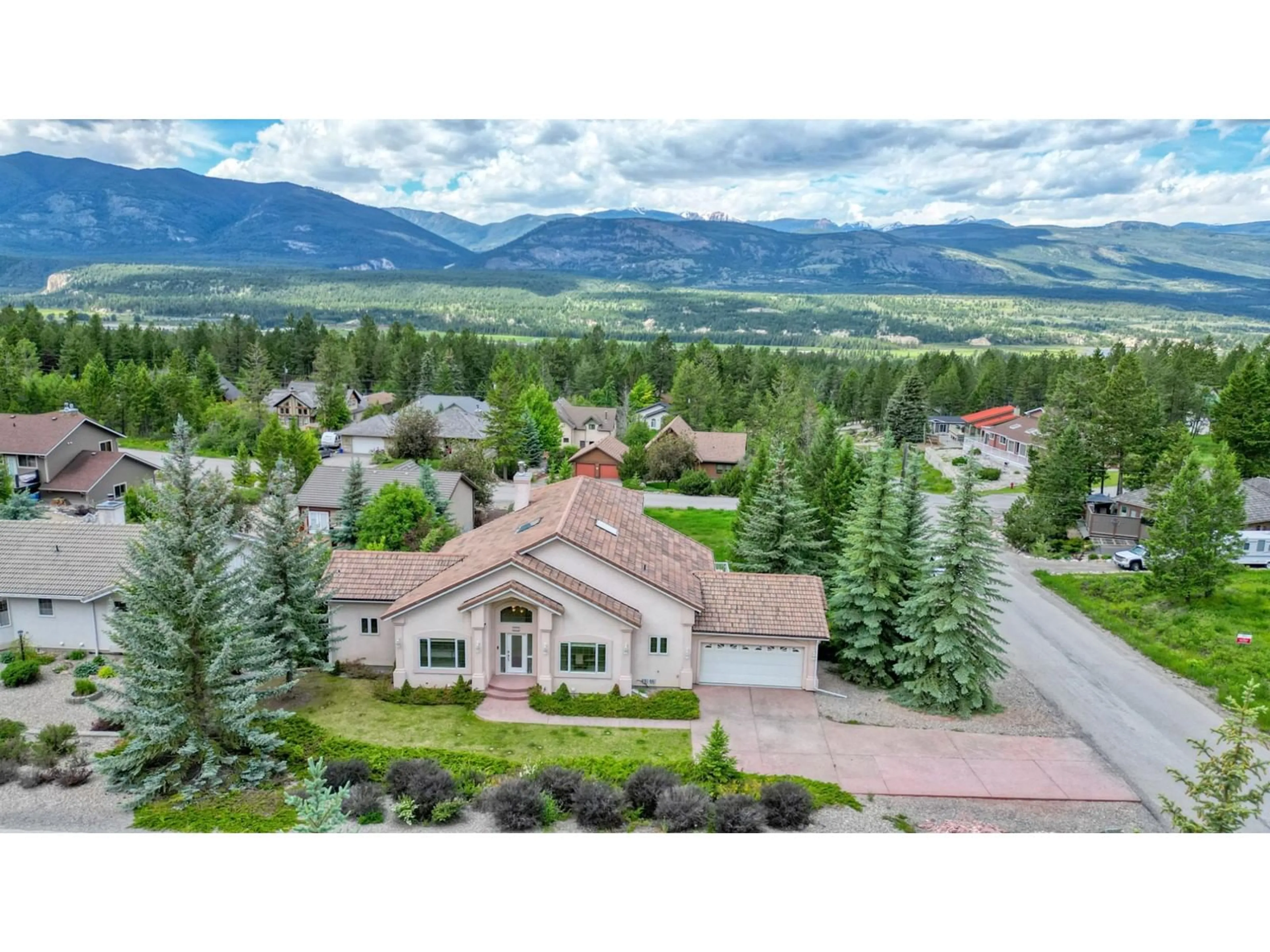 Frontside or backside of a home, the street view for 4985 MOUNTAIN TOP Drive, Fairmont Hot Springs British Columbia V0B1L1