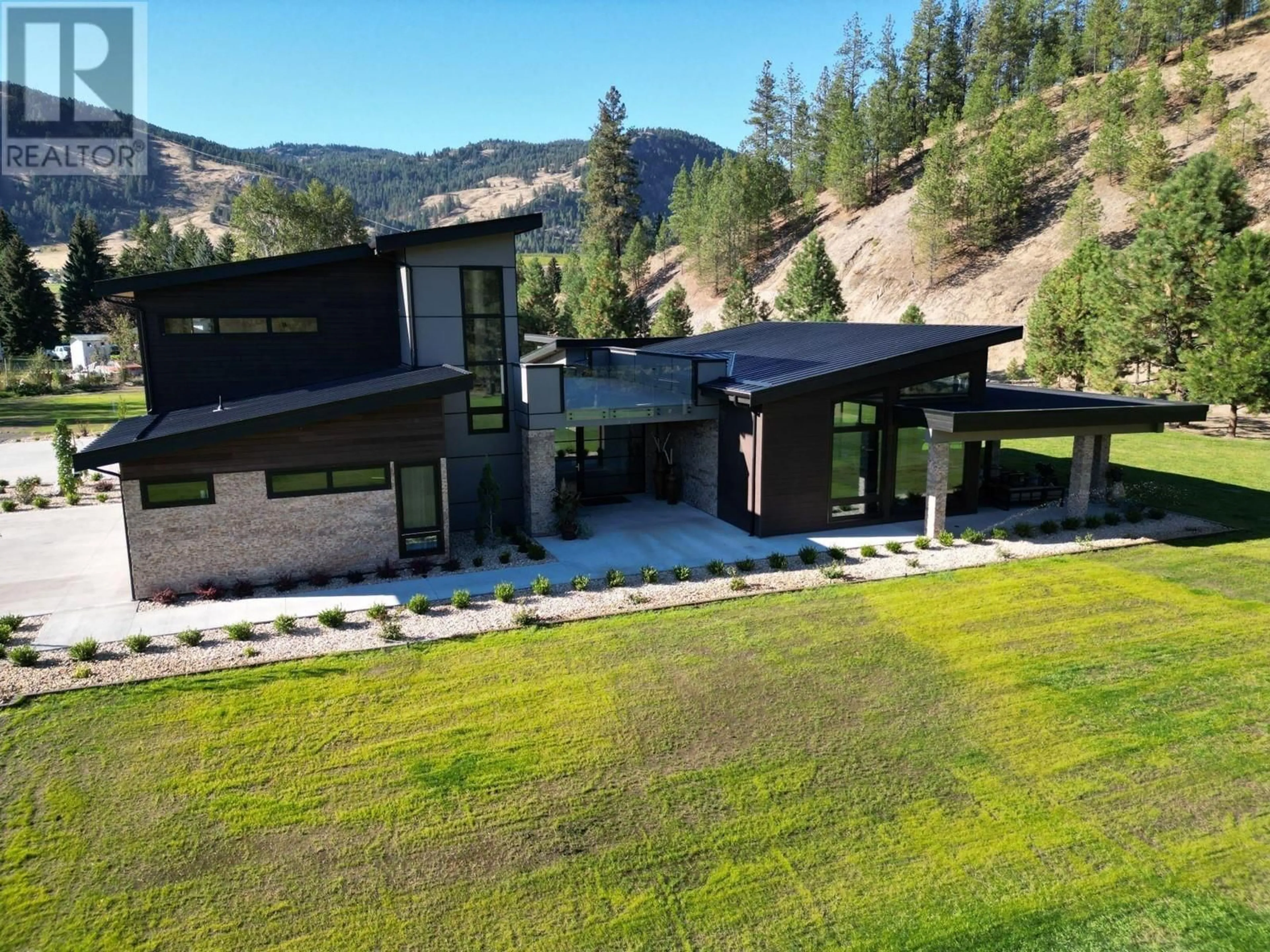 A pic from outside/outdoor area/front of a property/back of a property/a pic from drone, mountain view for 2465 COALCHUTE ROAD, Grand Forks British Columbia V0H1H2