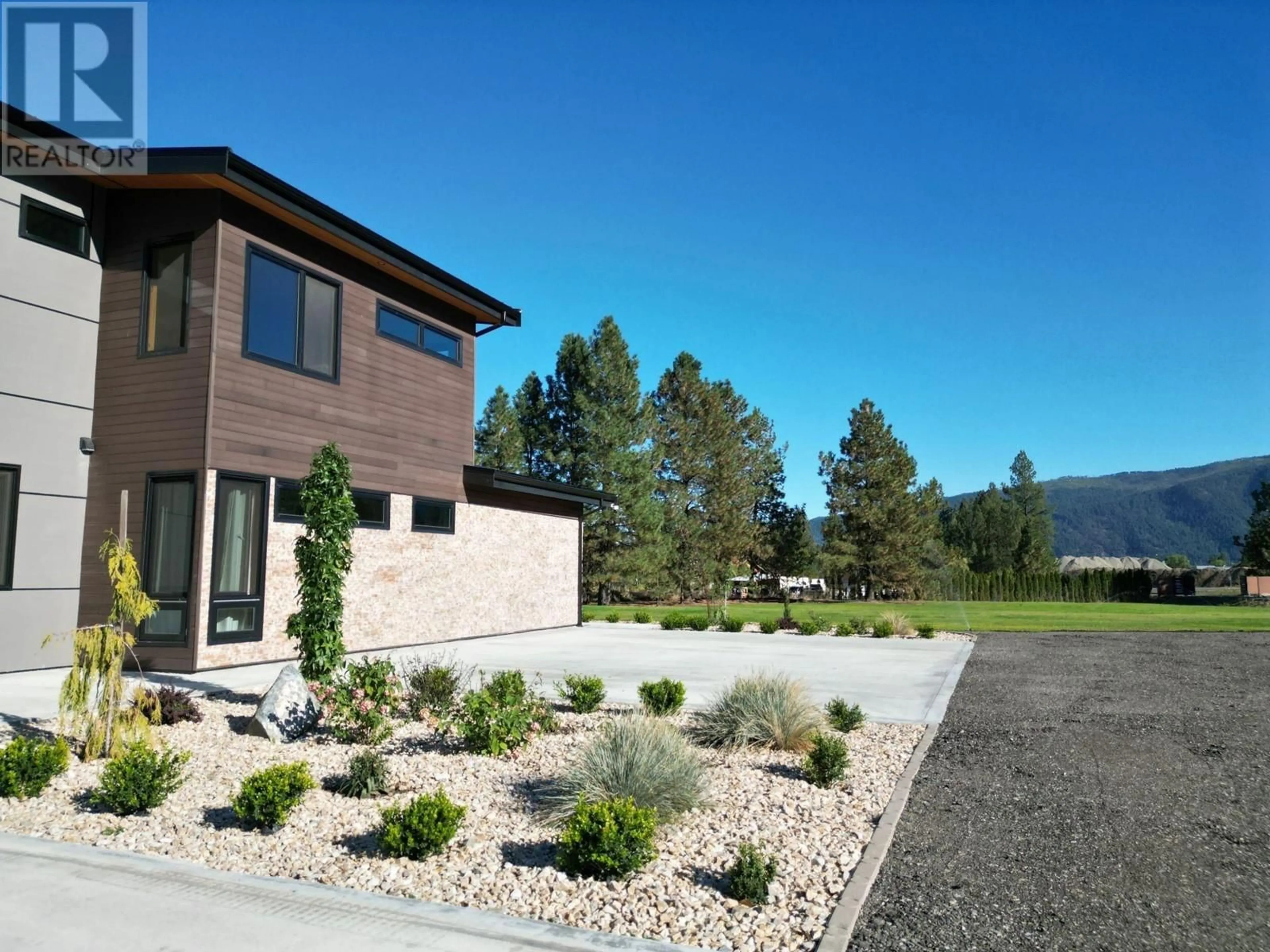 Home with vinyl exterior material, mountain view for 2465 COALCHUTE ROAD, Grand Forks British Columbia V0H1H2