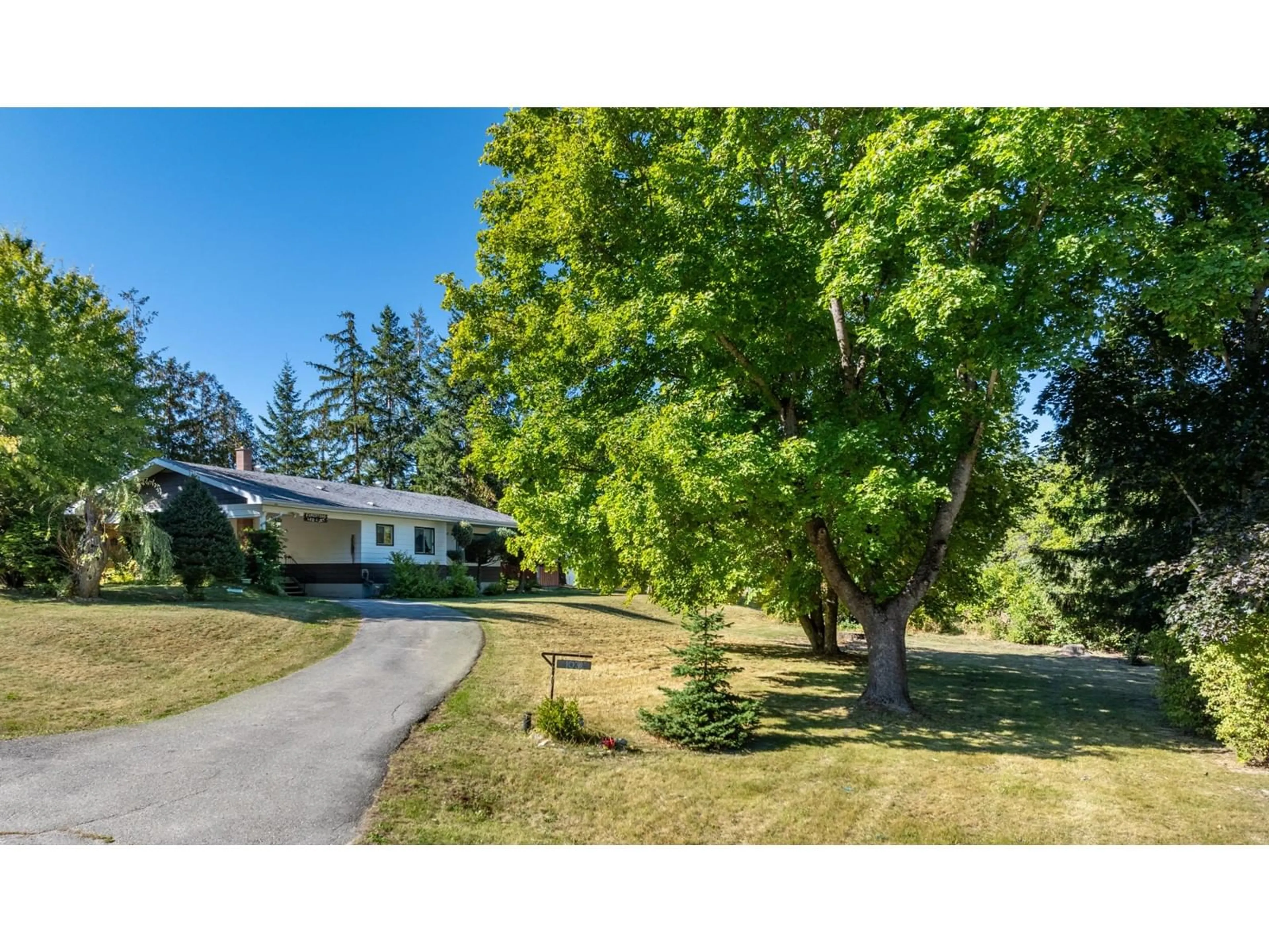 Frontside or backside of a home for 1031 7TH AVENUE N, Creston British Columbia V0B1G6