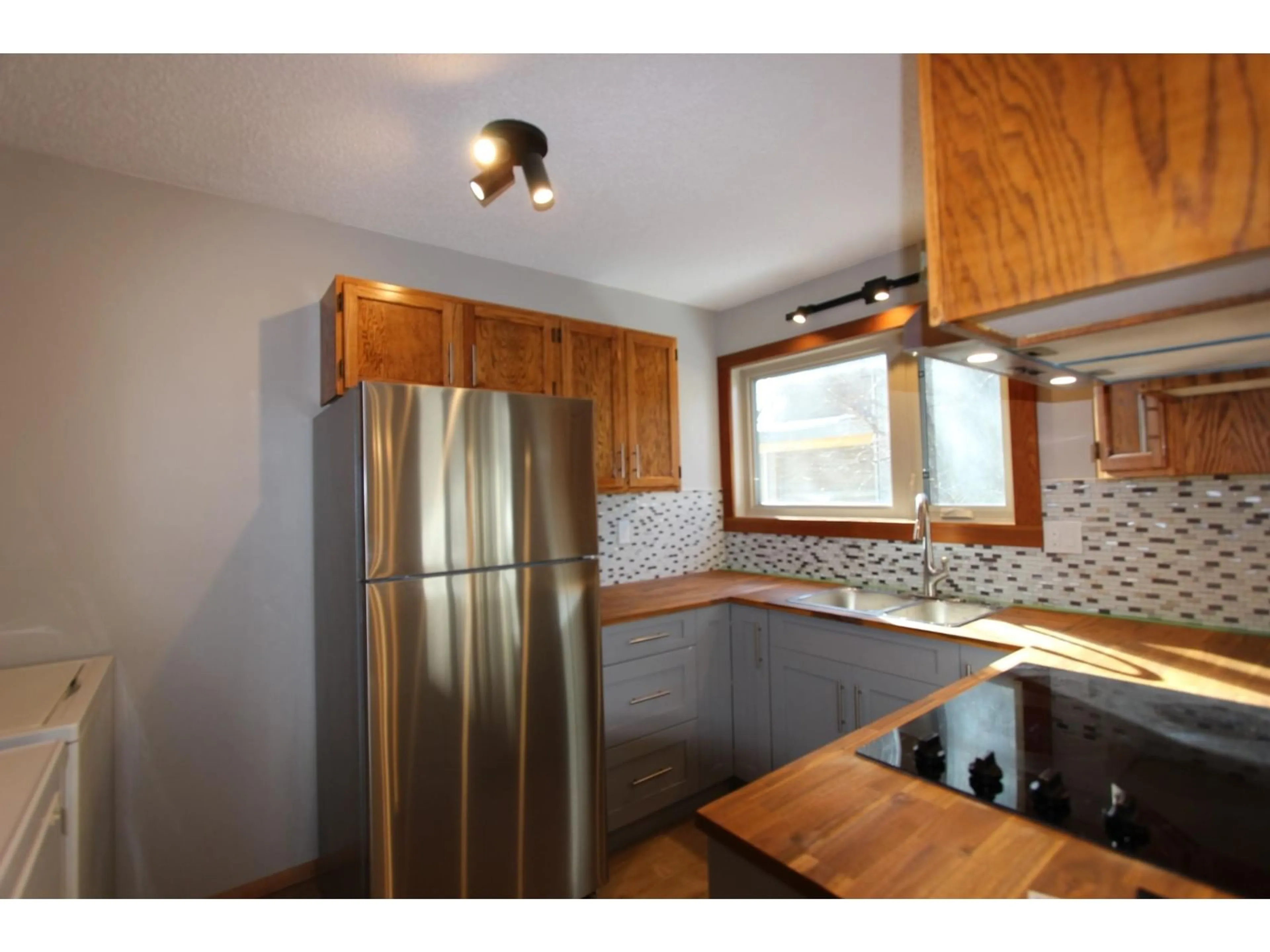 Standard kitchen, wood floors, cottage for 1291 9TH Avenue, Fernie British Columbia V0B1M0