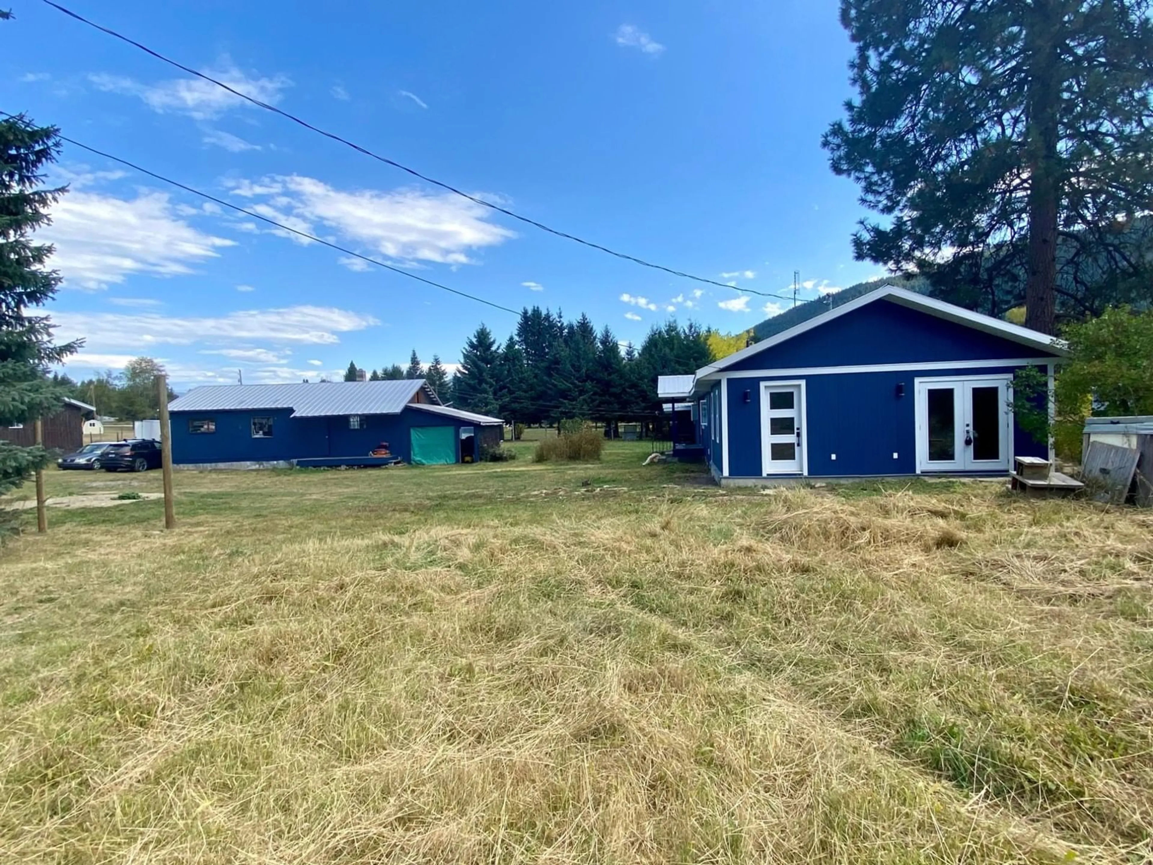 Frontside or backside of a home, the fenced backyard for 3464 KRESTOVA Crescent, Krestova British Columbia V0G1H2