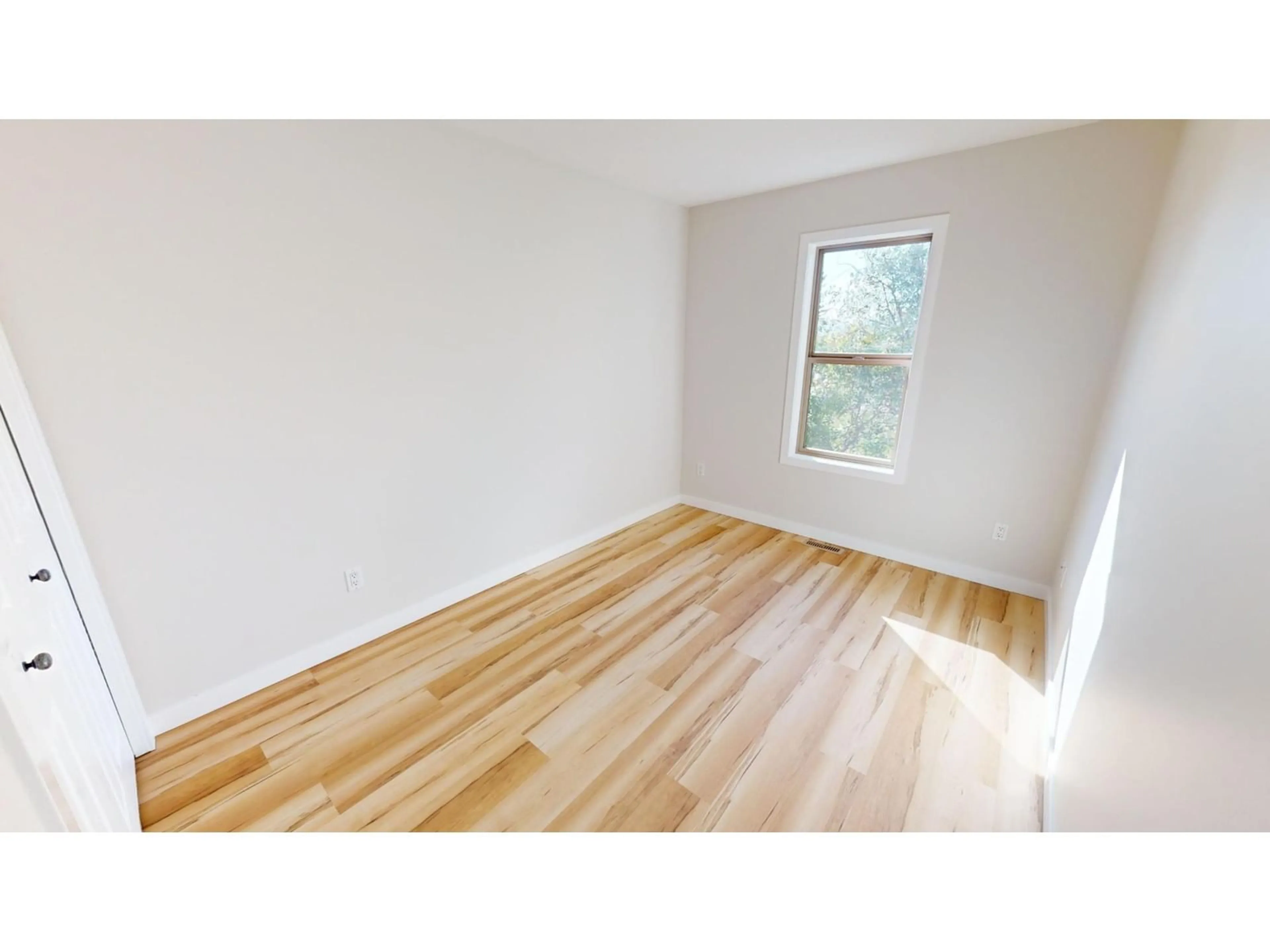 A pic of a room, wood floors for 200 10TH Avenue Unit# 8, Invermere British Columbia V0A1K0