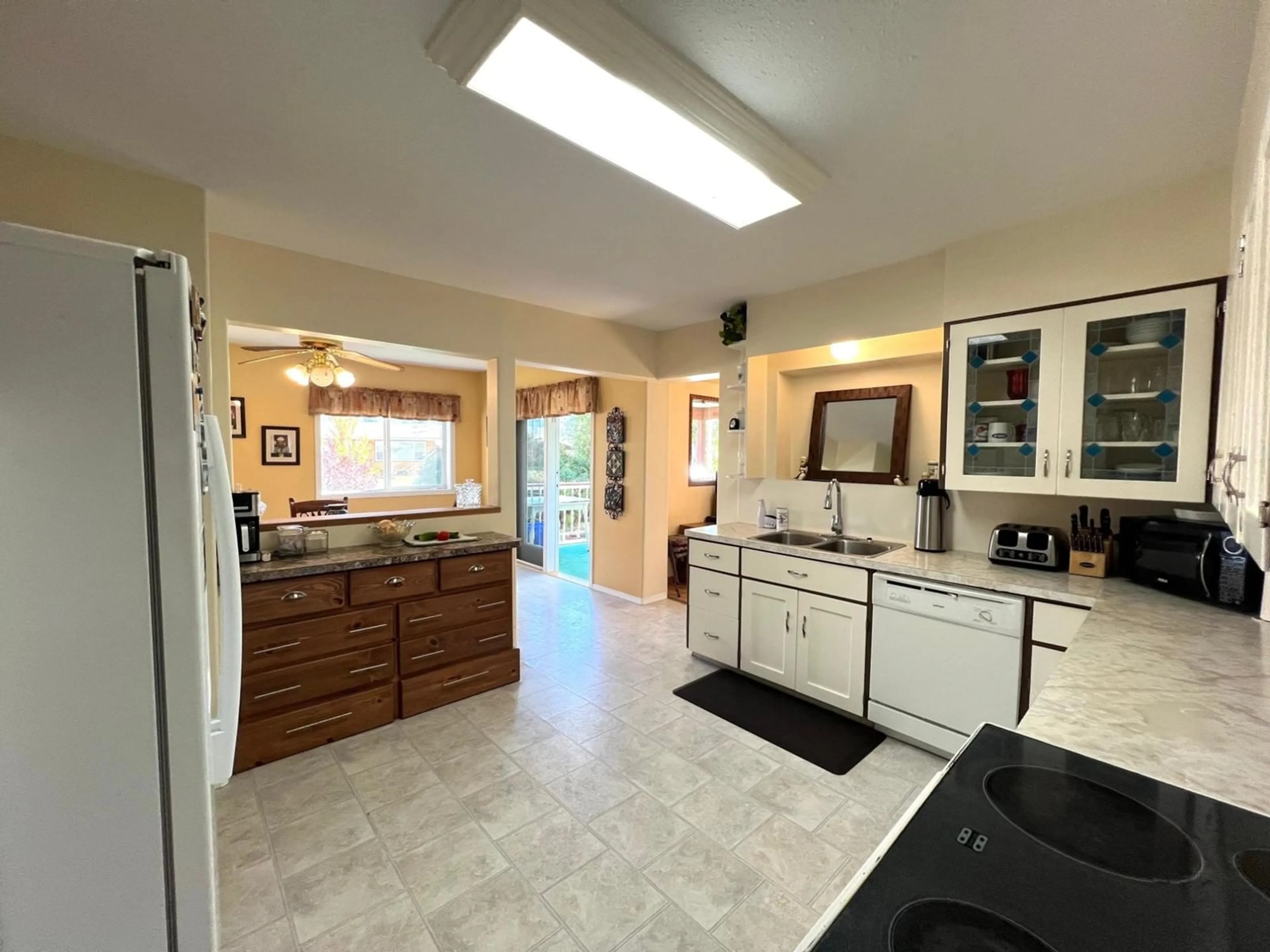 Kitchen, wood floors, cottage for 21 SHORT Street, Fruitvale British Columbia V0G1L0