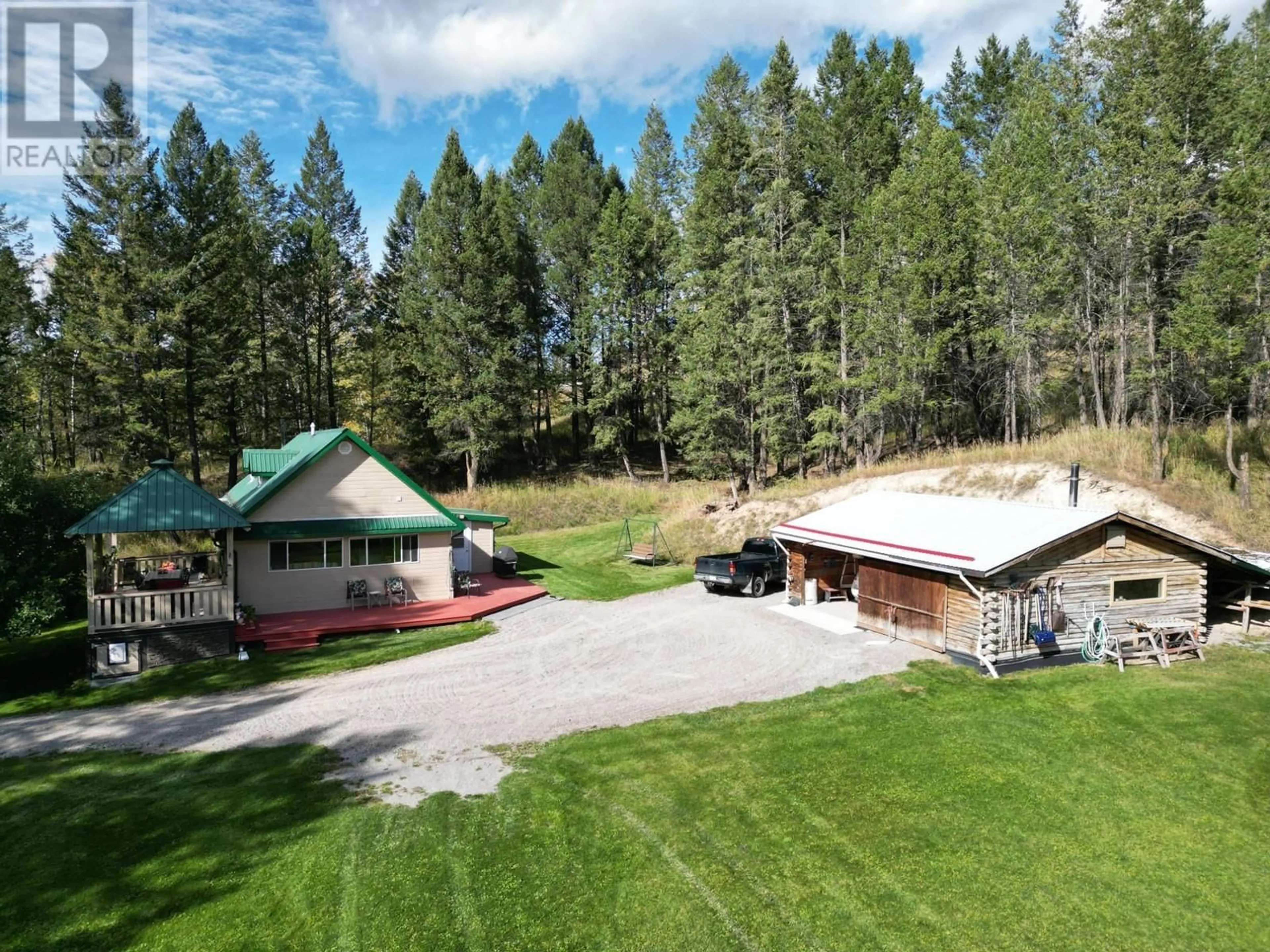 A pic from outside/outdoor area/front of a property/back of a property/a pic from drone, mountain view for 5670 GLENMORE DRIVE, Edgewater British Columbia V0A1E0