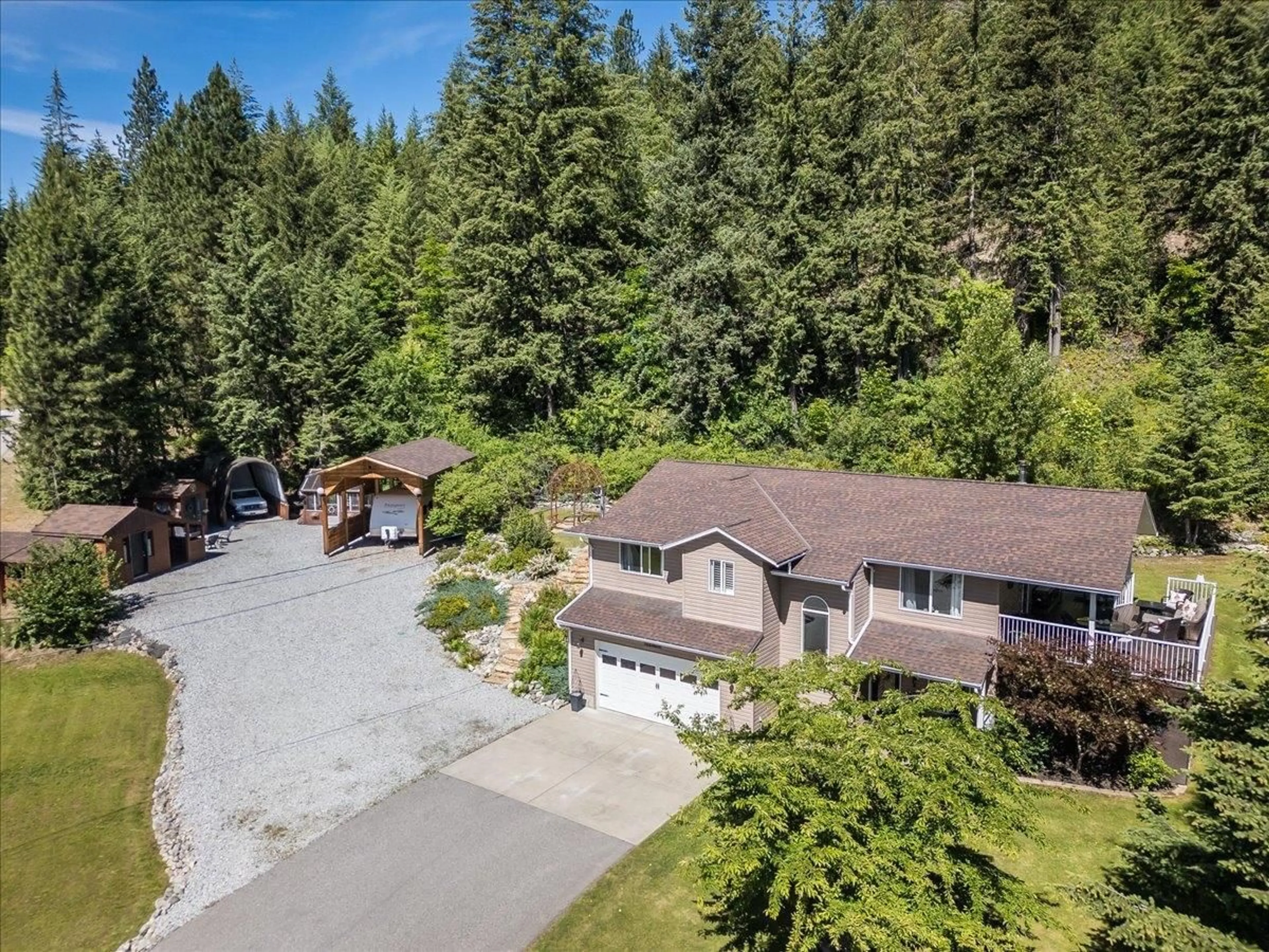 Frontside or backside of a home, cottage for 5913 BLUEBIRD Road, Taghum British Columbia V1L6X9