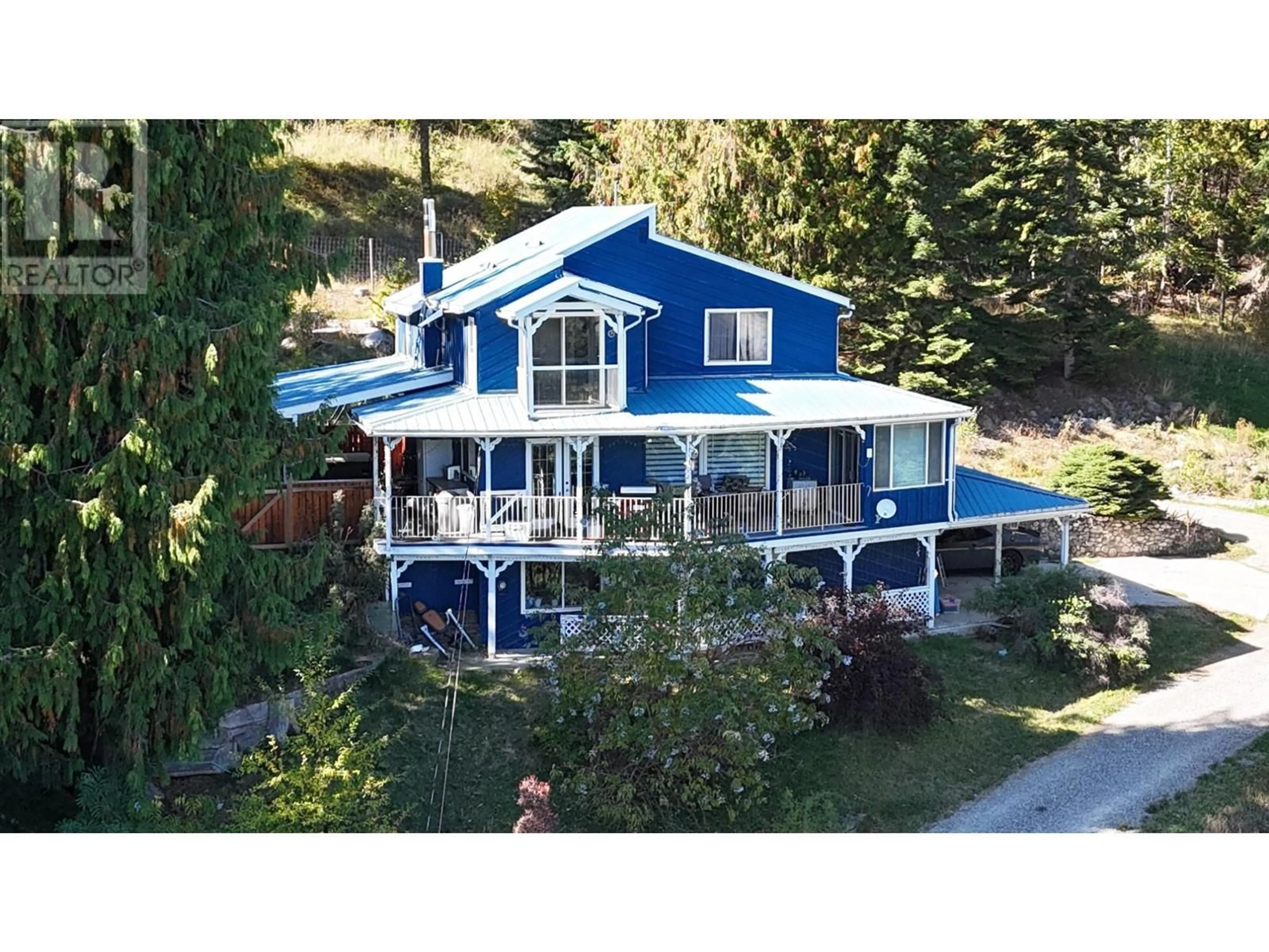 A pic from outside/outdoor area/front of a property/back of a property/a pic from drone, water/lake/river/ocean view for 1621 EVANS ROAD, Creston British Columbia V0B1G7