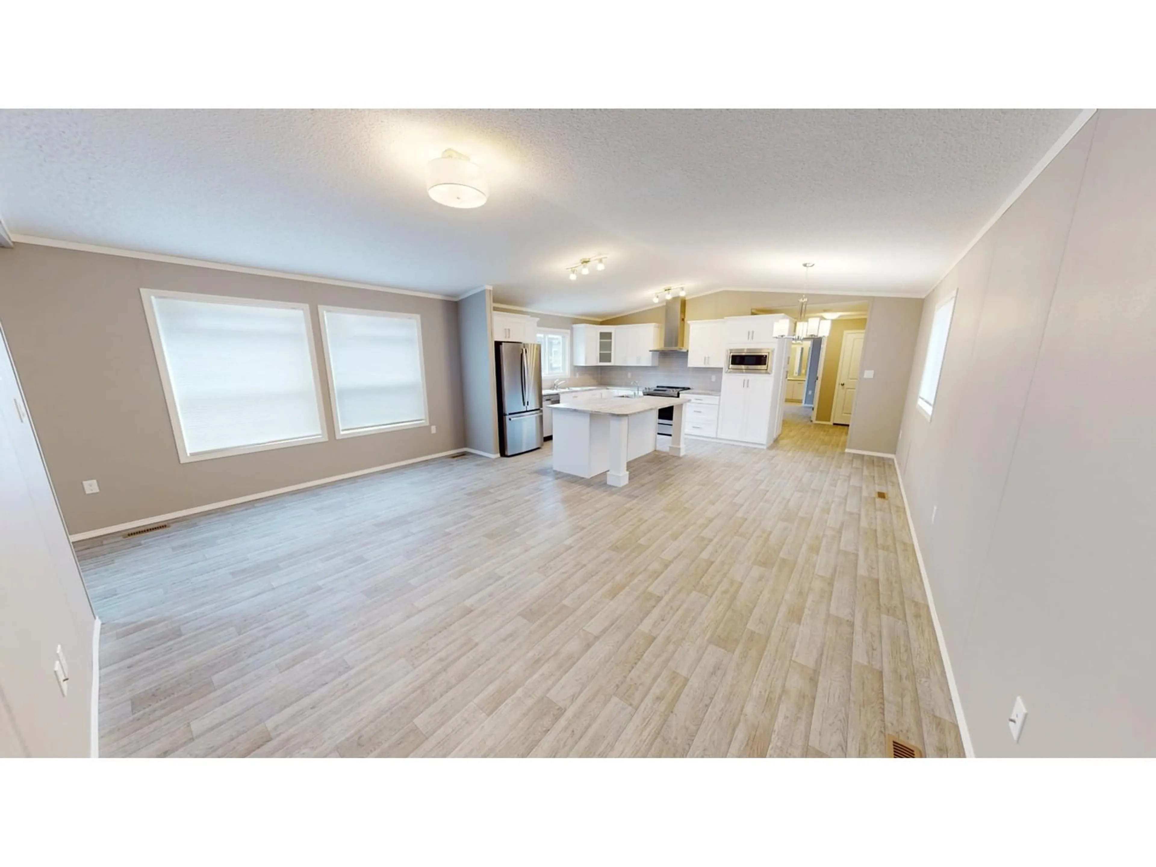 A pic of a room, wood floors for 60 COKATO Road Unit# F5, Fernie British Columbia V0B1M4