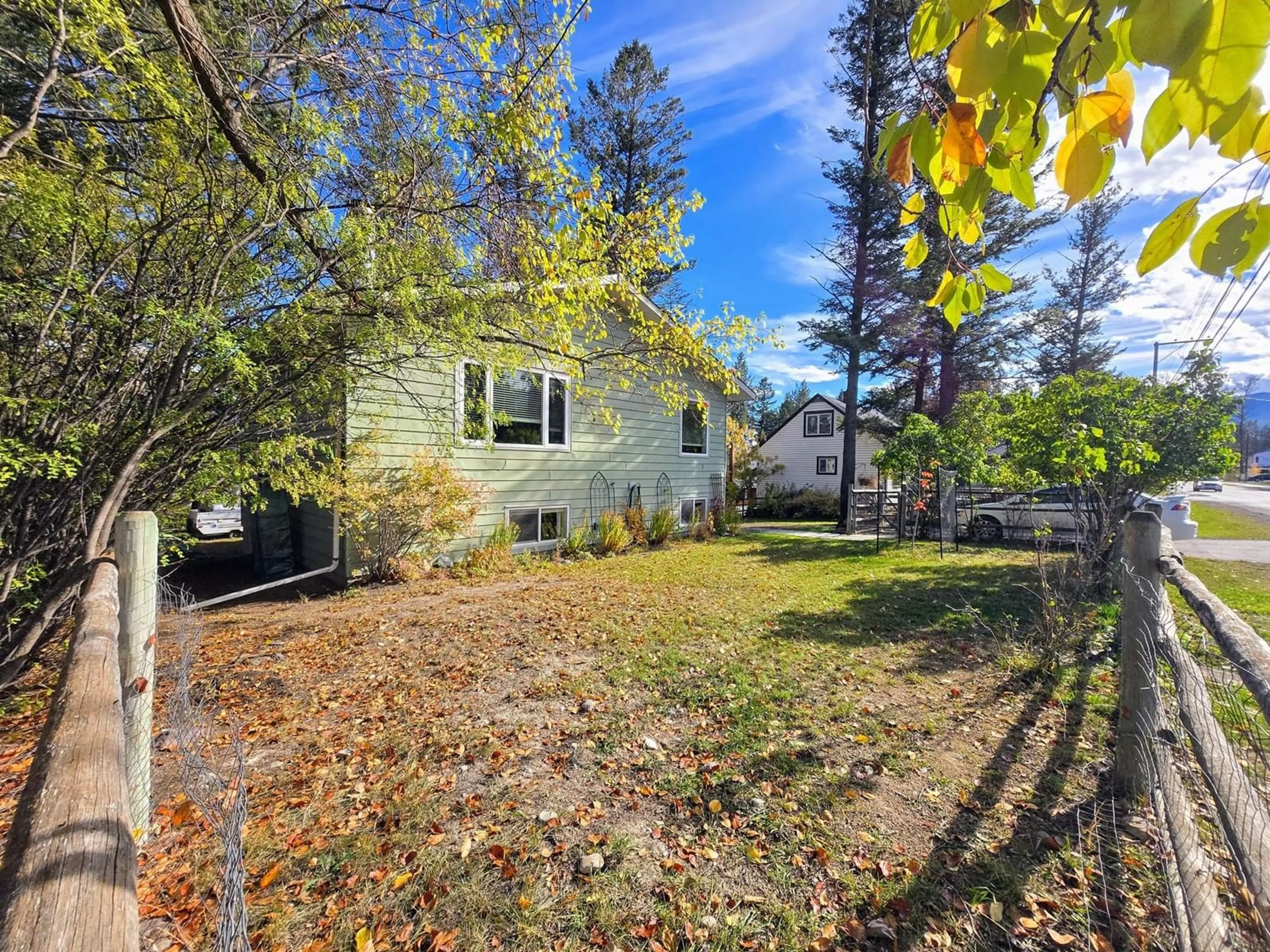 A pic from exterior of the house or condo, the fenced backyard for 1425 13TH Avenue, Invermere British Columbia V0A1K0