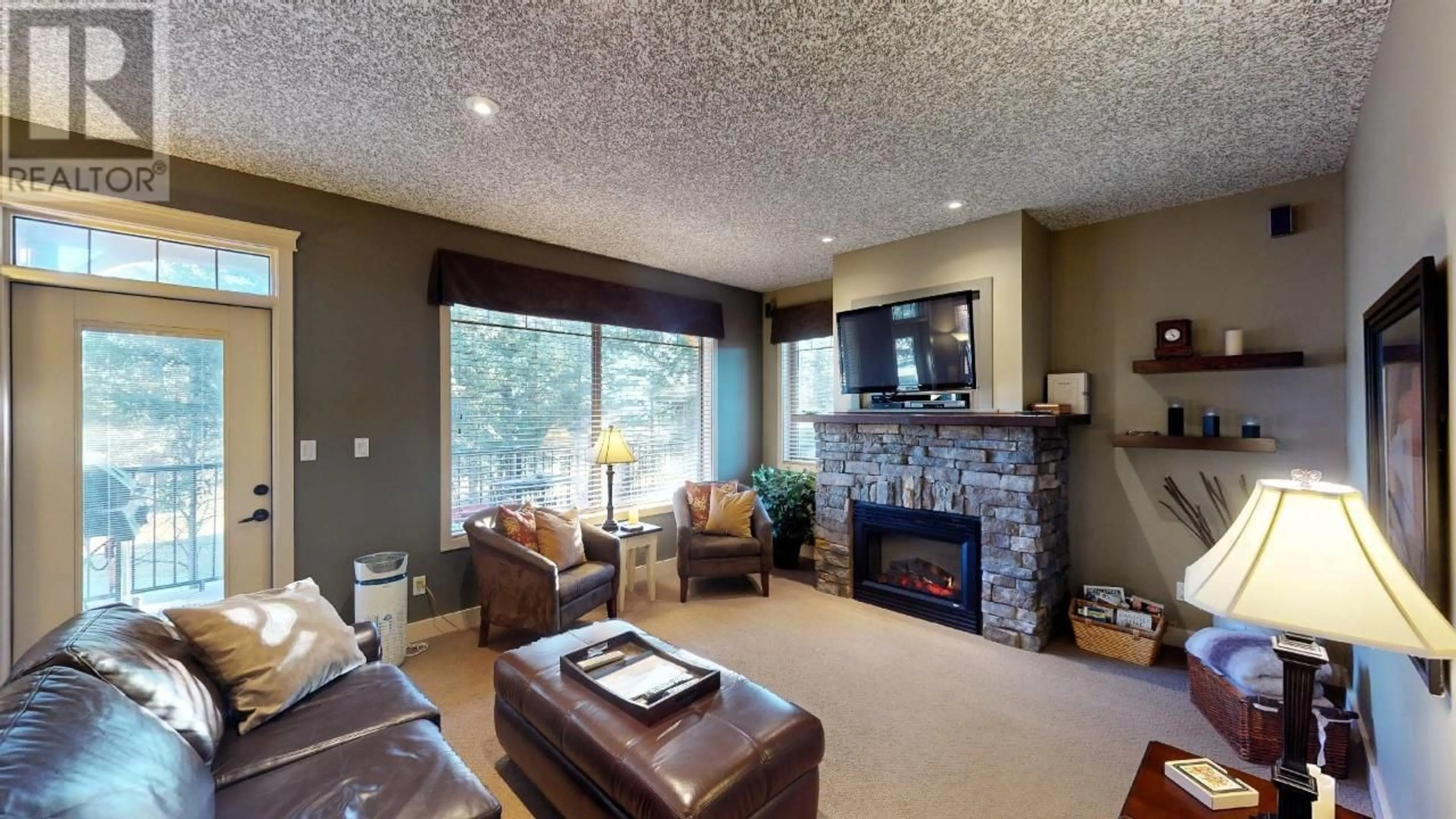Living room with furniture, unknown for 324 - 300 BIGHORN BOULEVARD, Radium Hot Springs British Columbia V0A1M0