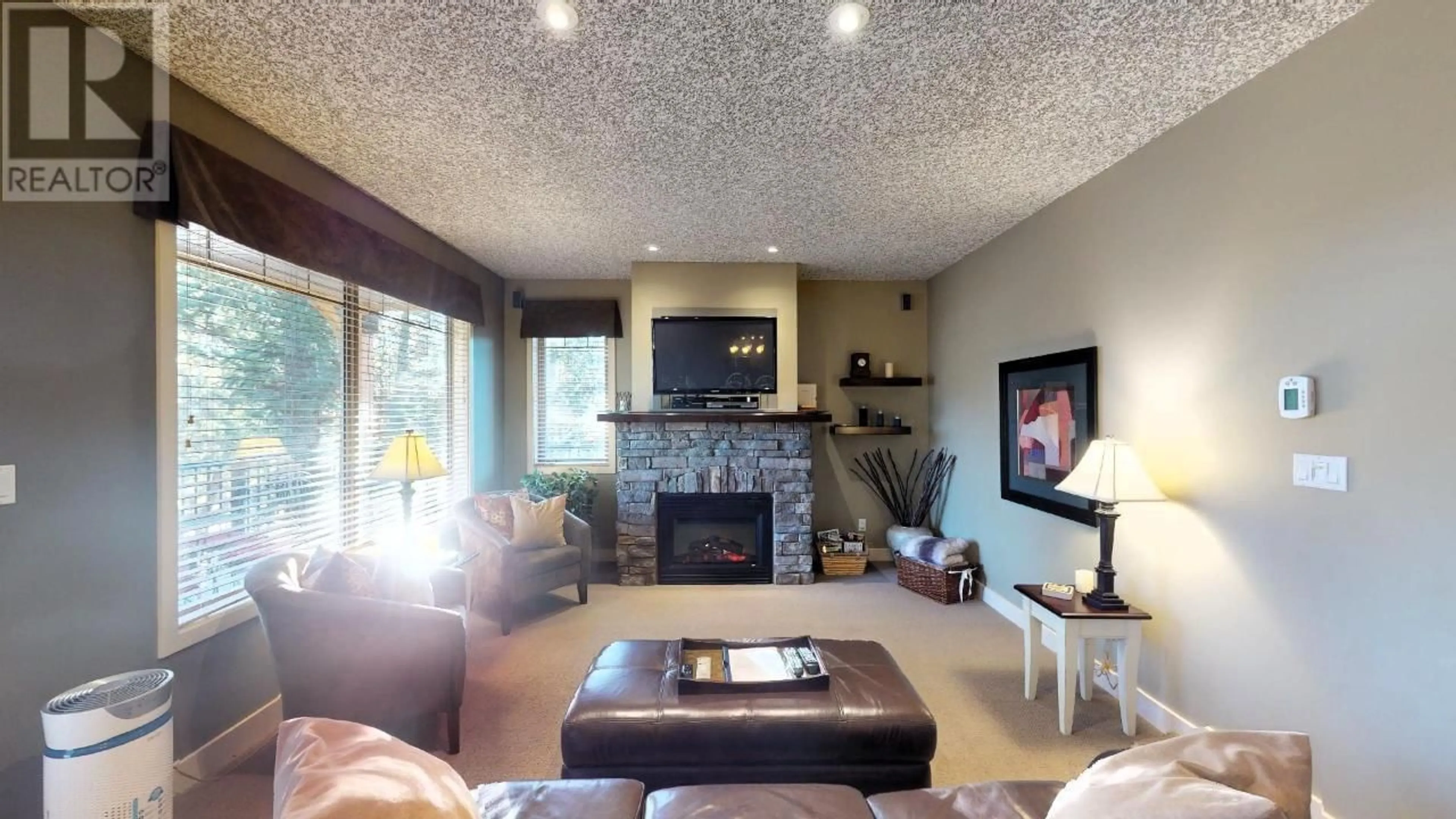 Living room with furniture, unknown for 324 - 300 BIGHORN BOULEVARD, Radium Hot Springs British Columbia V0A1M0