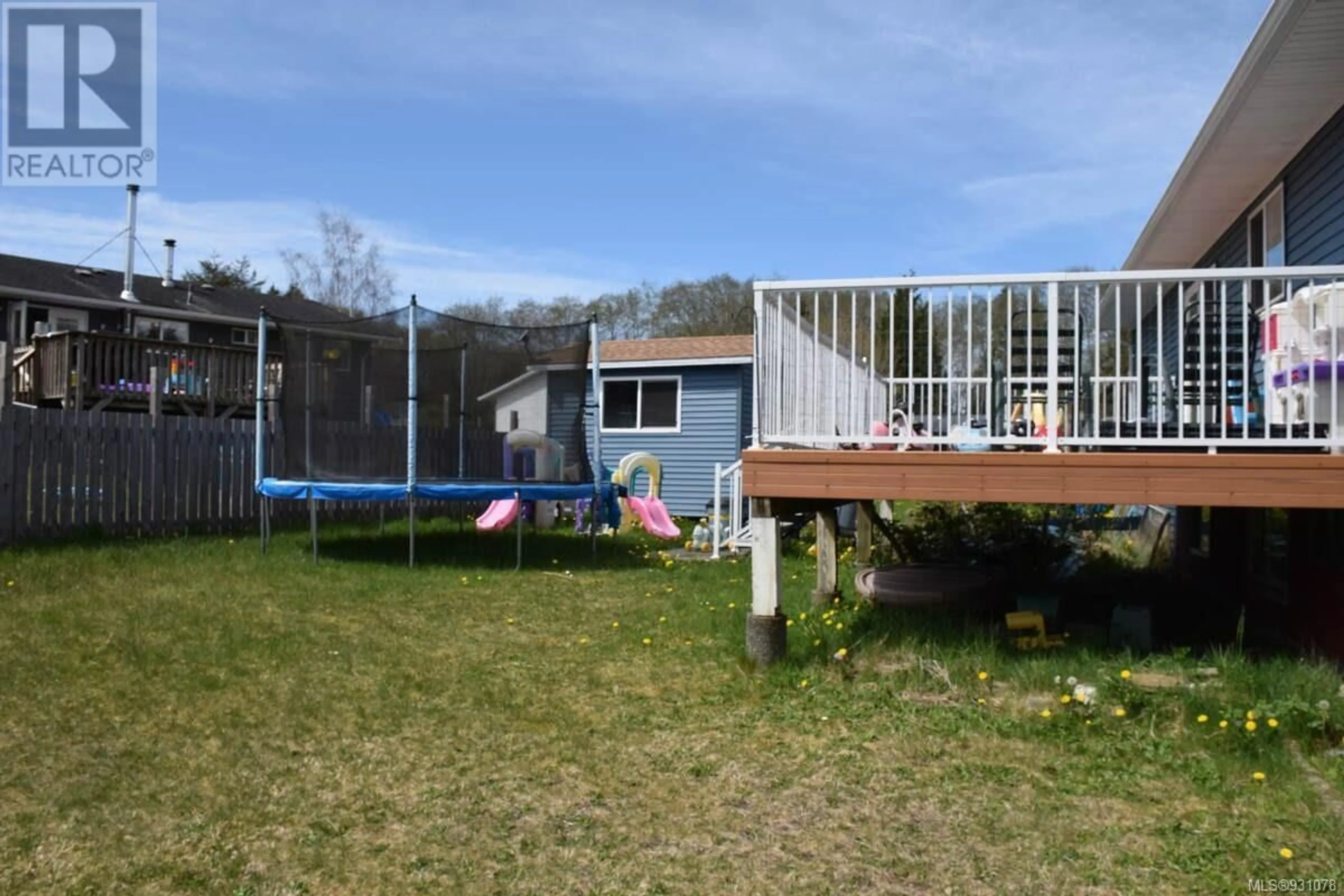 Patio, the fenced backyard for 7370 Thunderbird Way, Port Hardy British Columbia V0N2P0