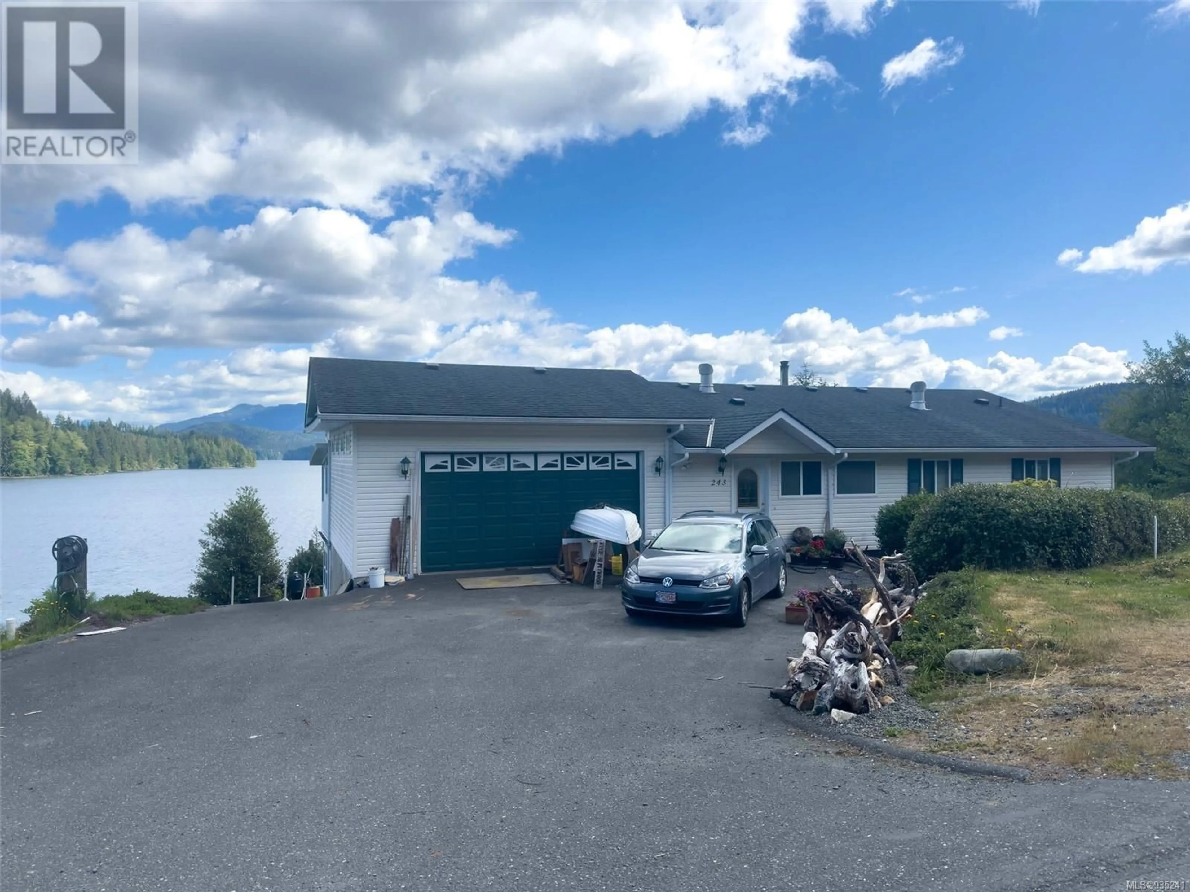 A pic from outside/outdoor area/front of a property/back of a property/a pic from drone, water/lake/river/ocean view for 243 HARBOUR ROAD, Coal Harbour British Columbia V0N1K0