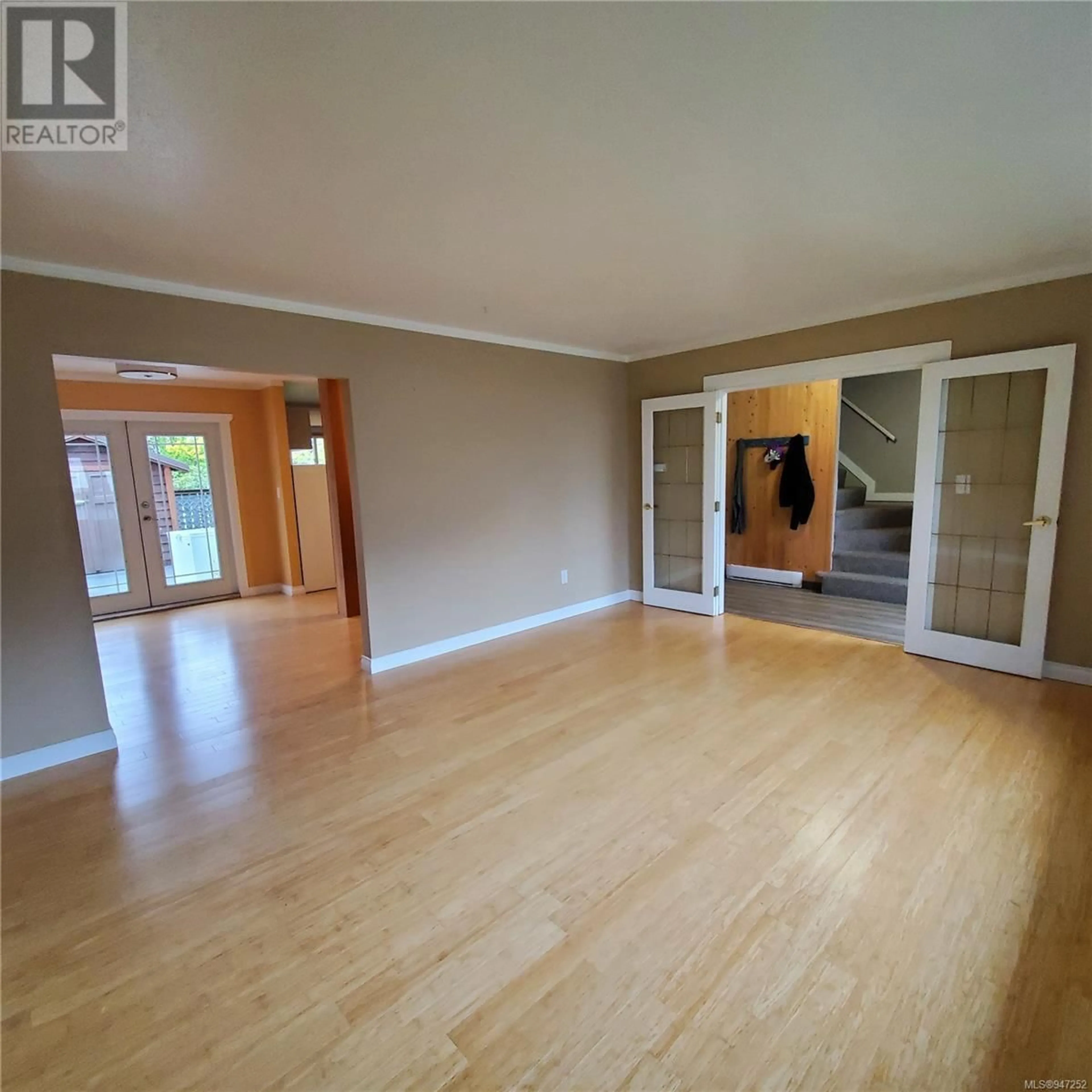 A pic of a room, wood floors for 8 500 Muchalat Pl, Gold River British Columbia V0P1G0