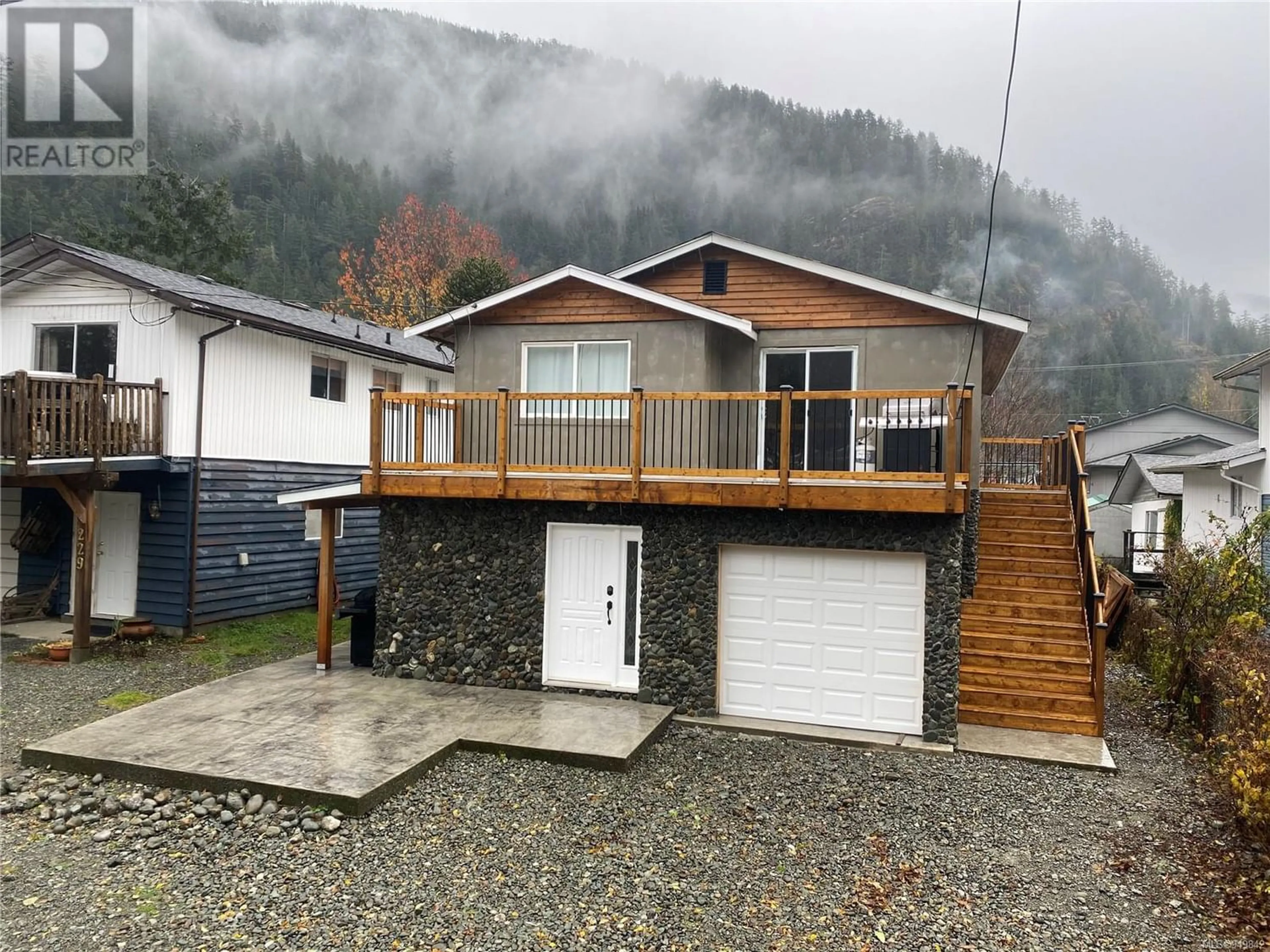 Frontside or backside of a home for 223 Maquinna Dr N, Tahsis British Columbia V0P1X0