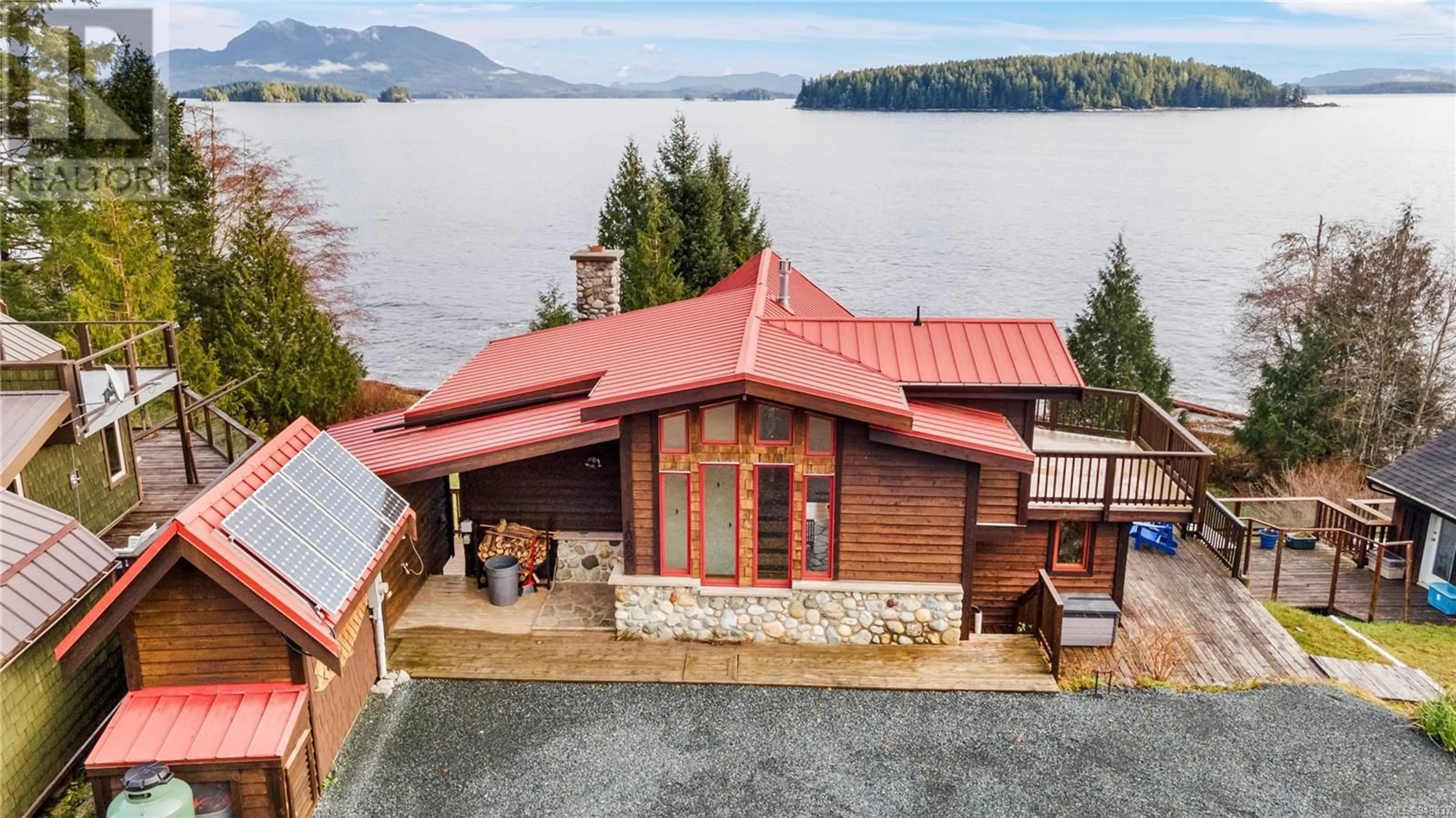 A pic from outside/outdoor area/front of a property/back of a property/a pic from drone, water/lake/river/ocean view for 1062 FIFTH AVENUE, Ucluelet British Columbia V0R3A0