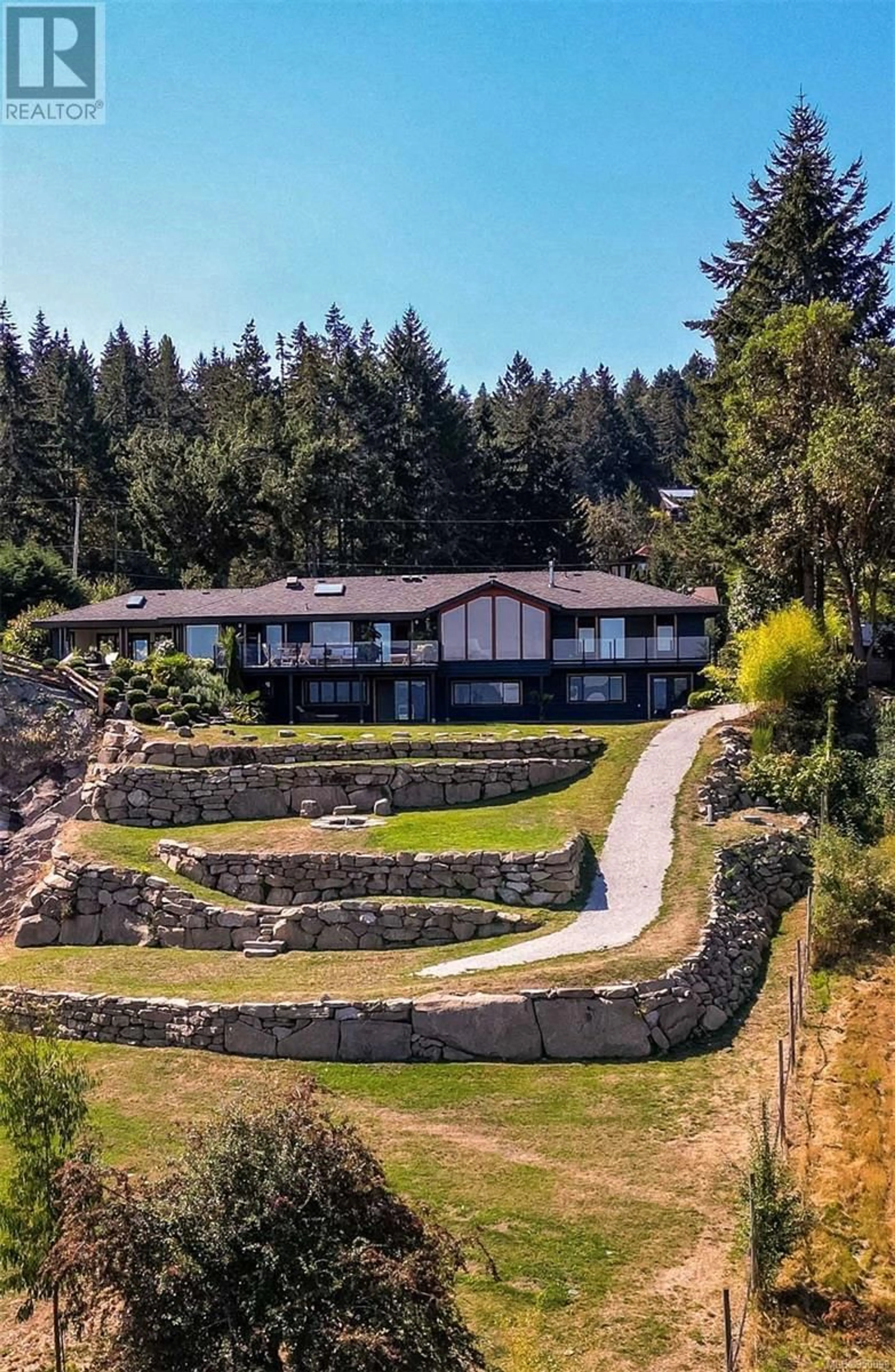 Frontside or backside of a home for 119 Castle Cross Rd, Salt Spring British Columbia V8K2G1