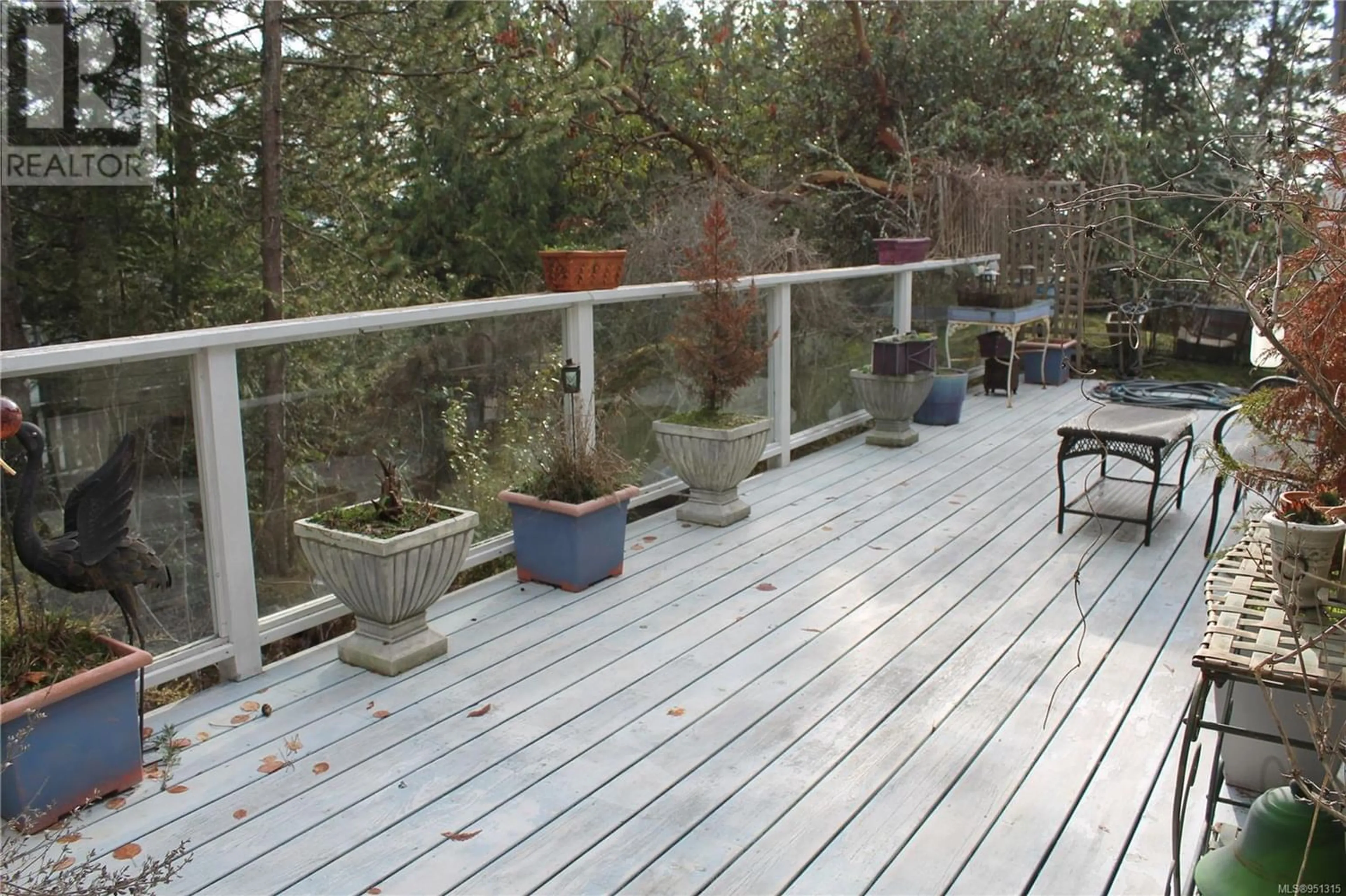 Patio, the fenced backyard for 4881 Pirates Rd, Pender Island British Columbia V0N2M2