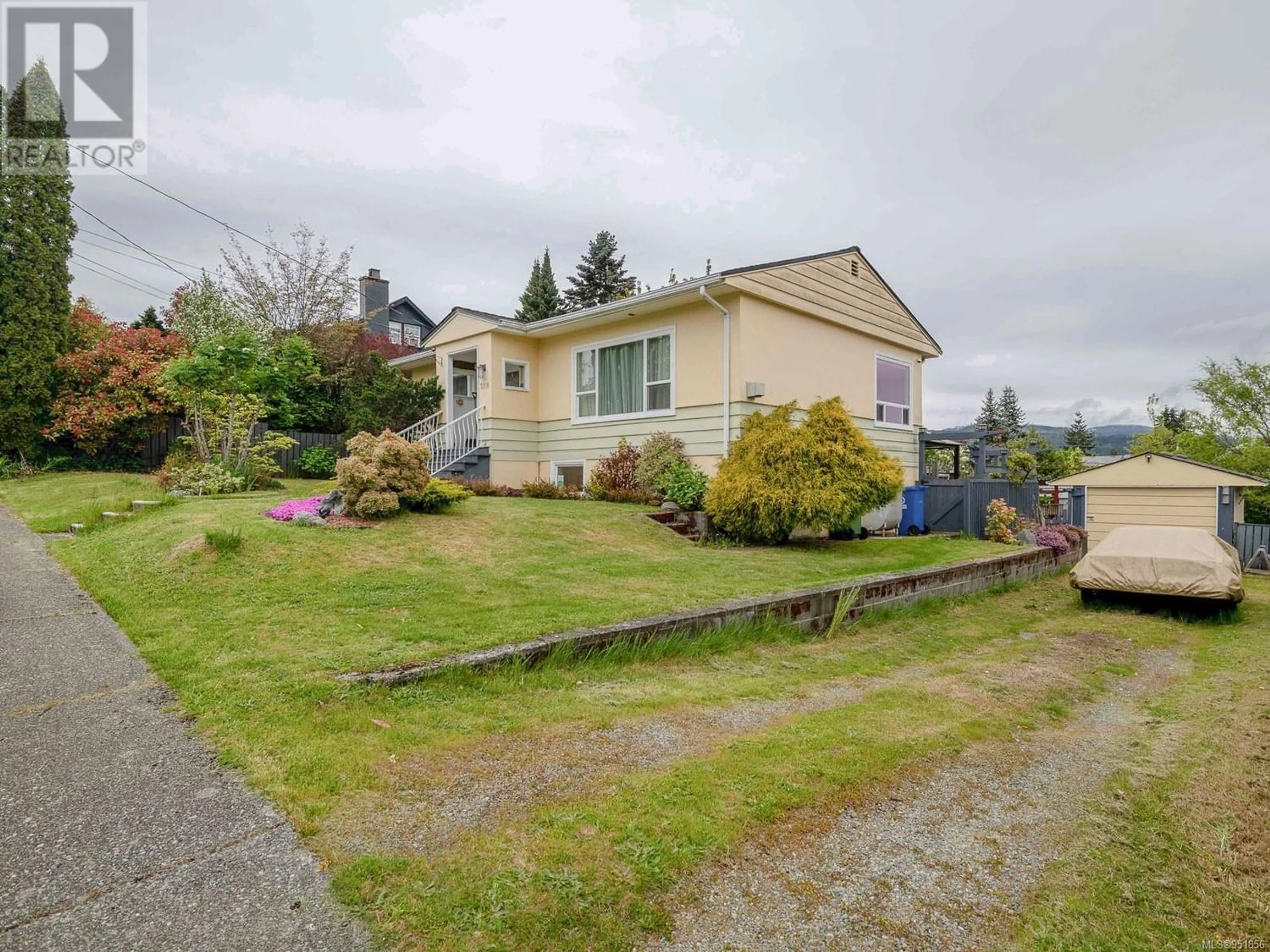 Frontside or backside of a home for 3058 12th Ave, Port Alberni British Columbia V9Y2T1