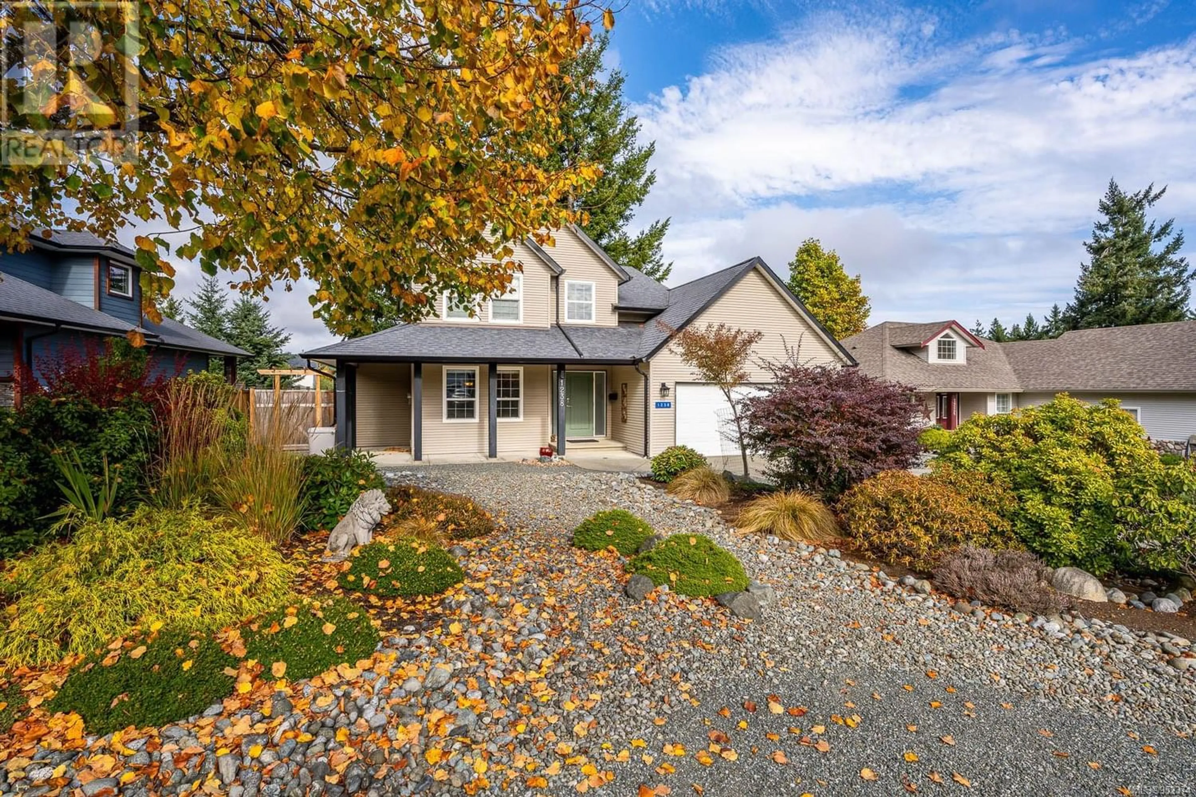 Frontside or backside of a home for 1238 Potter Pl, Comox British Columbia V9M4H5