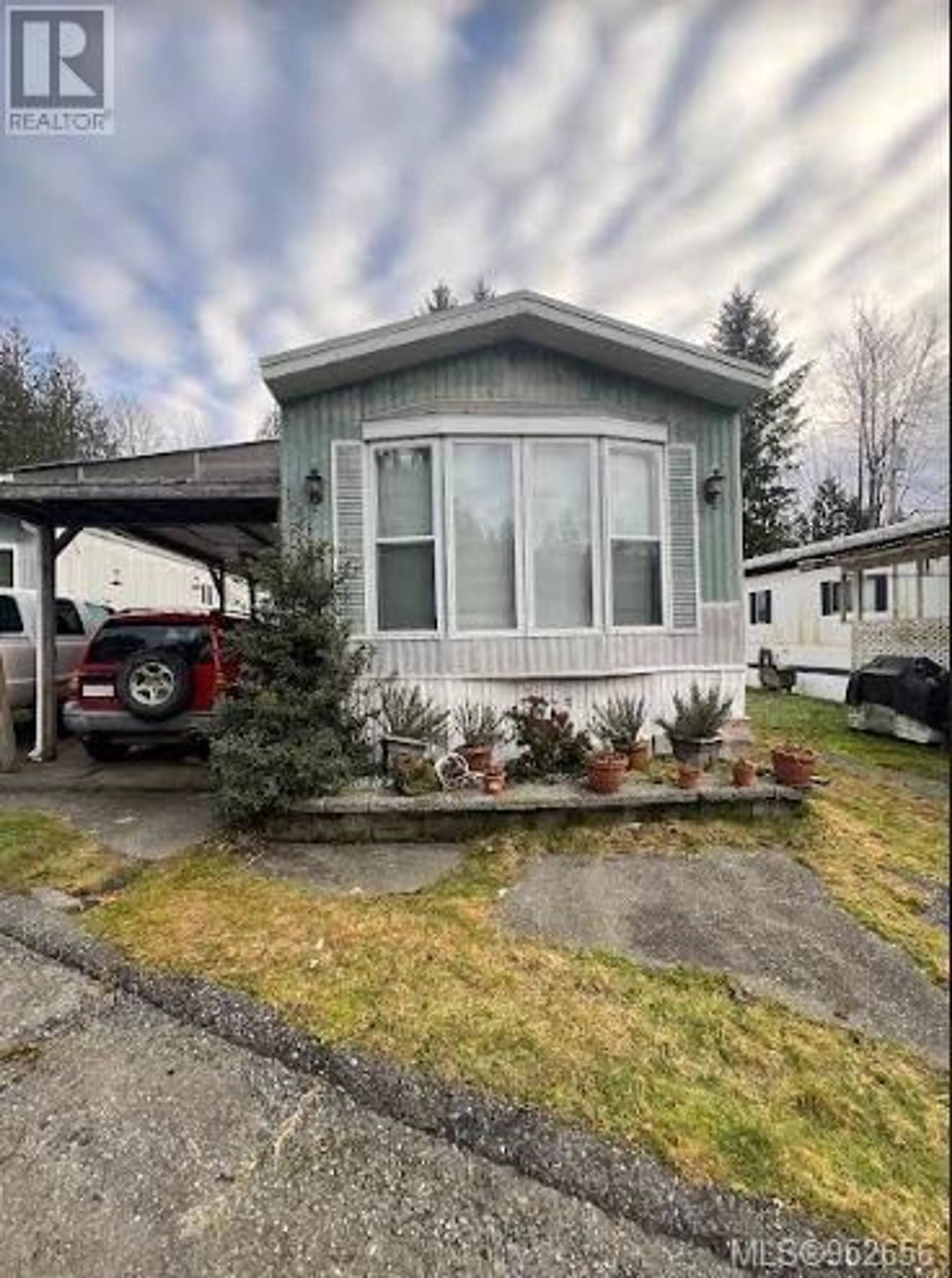 A pic from exterior of the house or condo, the street view for 7 8697 North Shore Rd, Lake Cowichan British Columbia V0R2G0