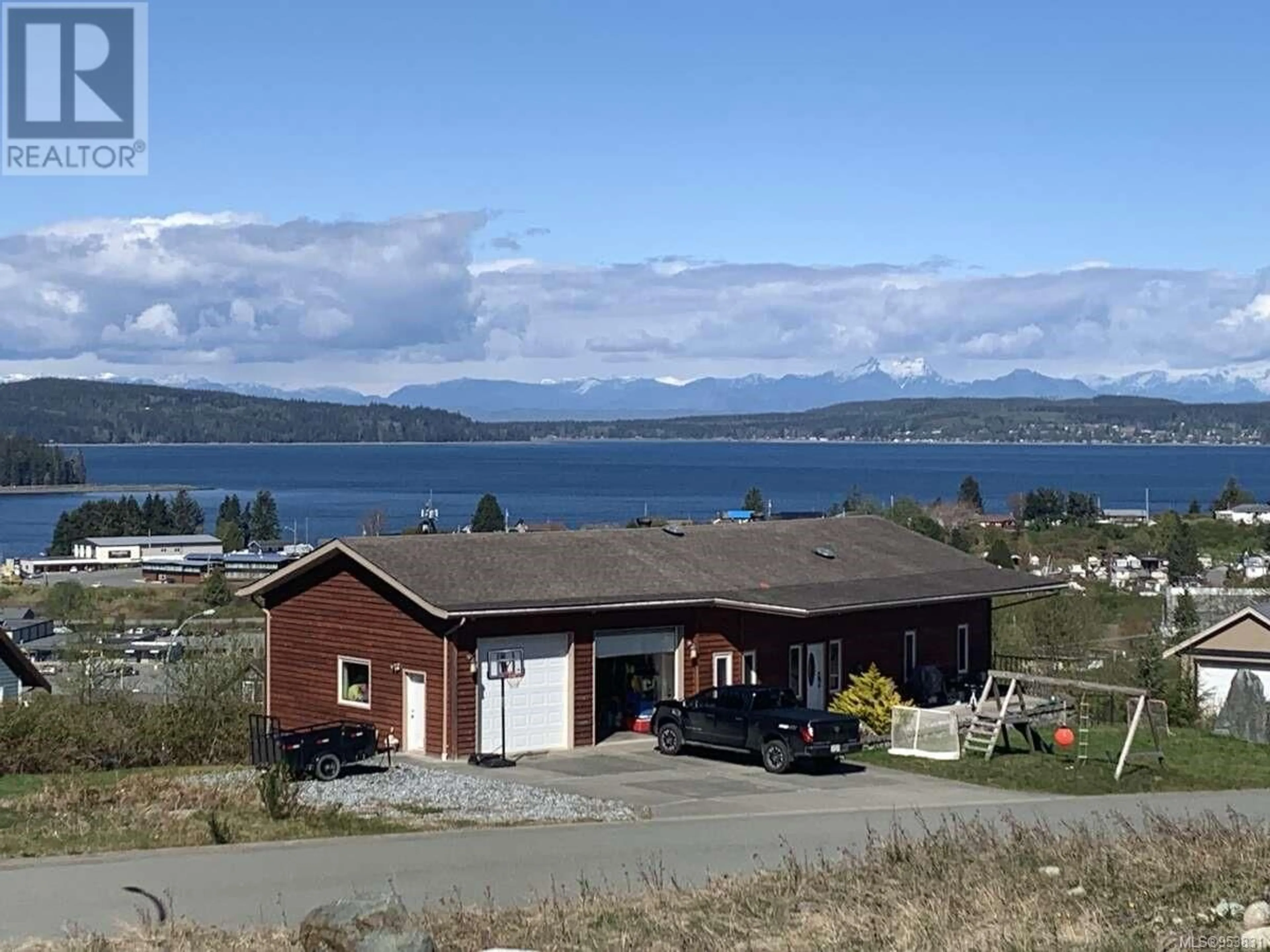 Frontside or backside of a home for 590 Venture Pl, Port McNeill British Columbia V0N2R0