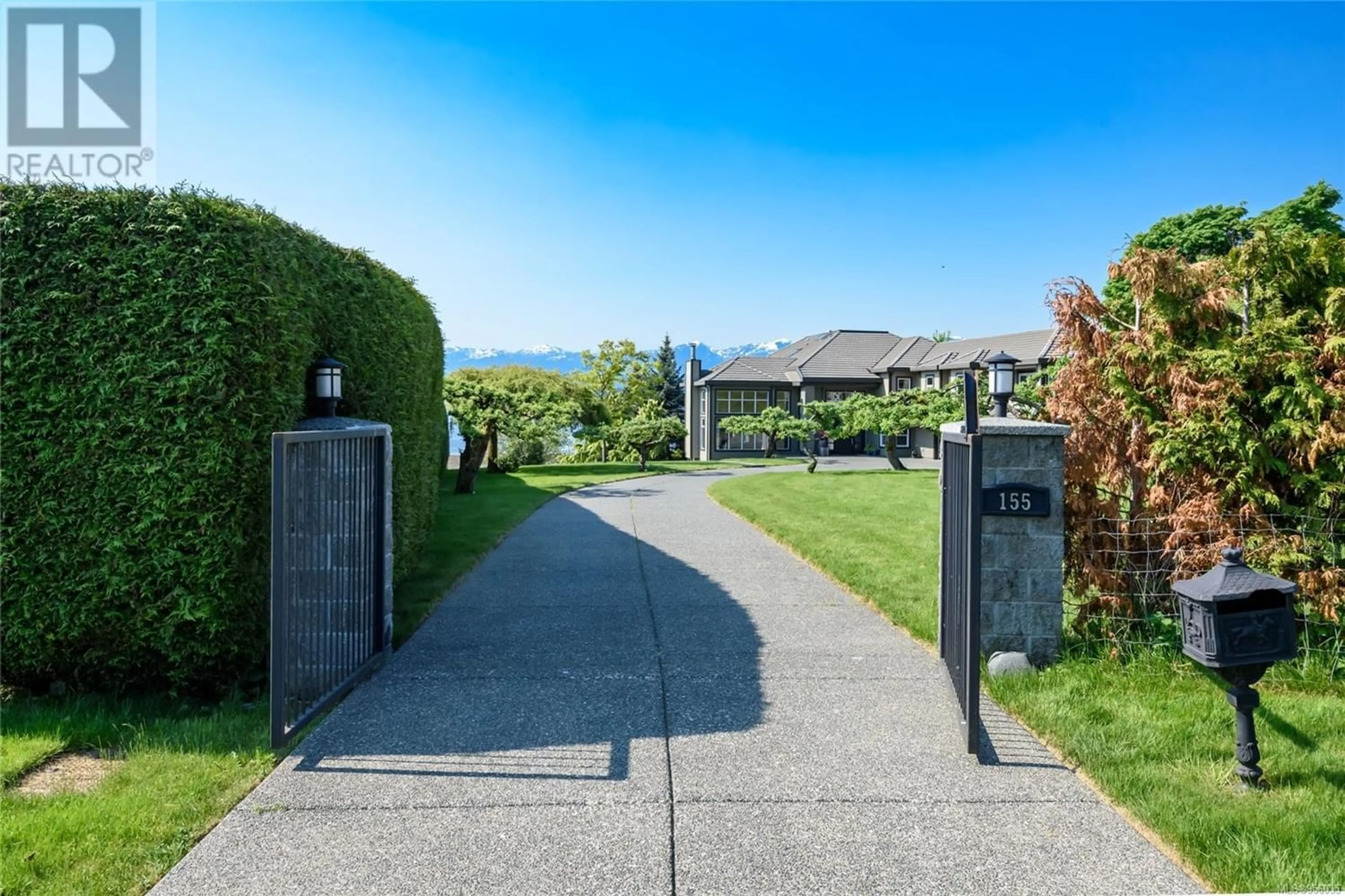 Frontside or backside of a home for 155 Willow Way, Comox British Columbia V9M1T1