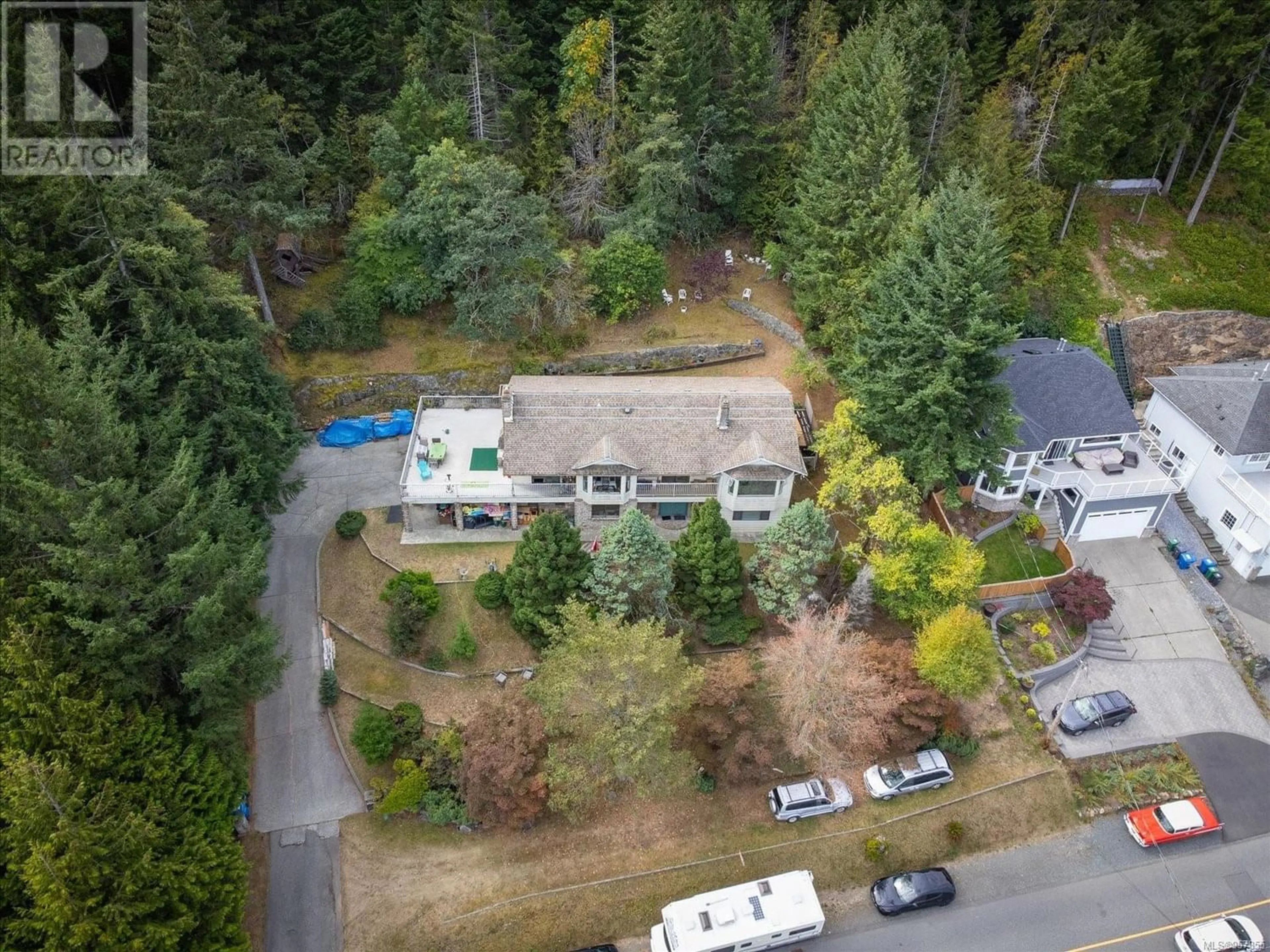 Frontside or backside of a home for 5227 Lost Lake Rd, Nanaimo British Columbia V9T5E6