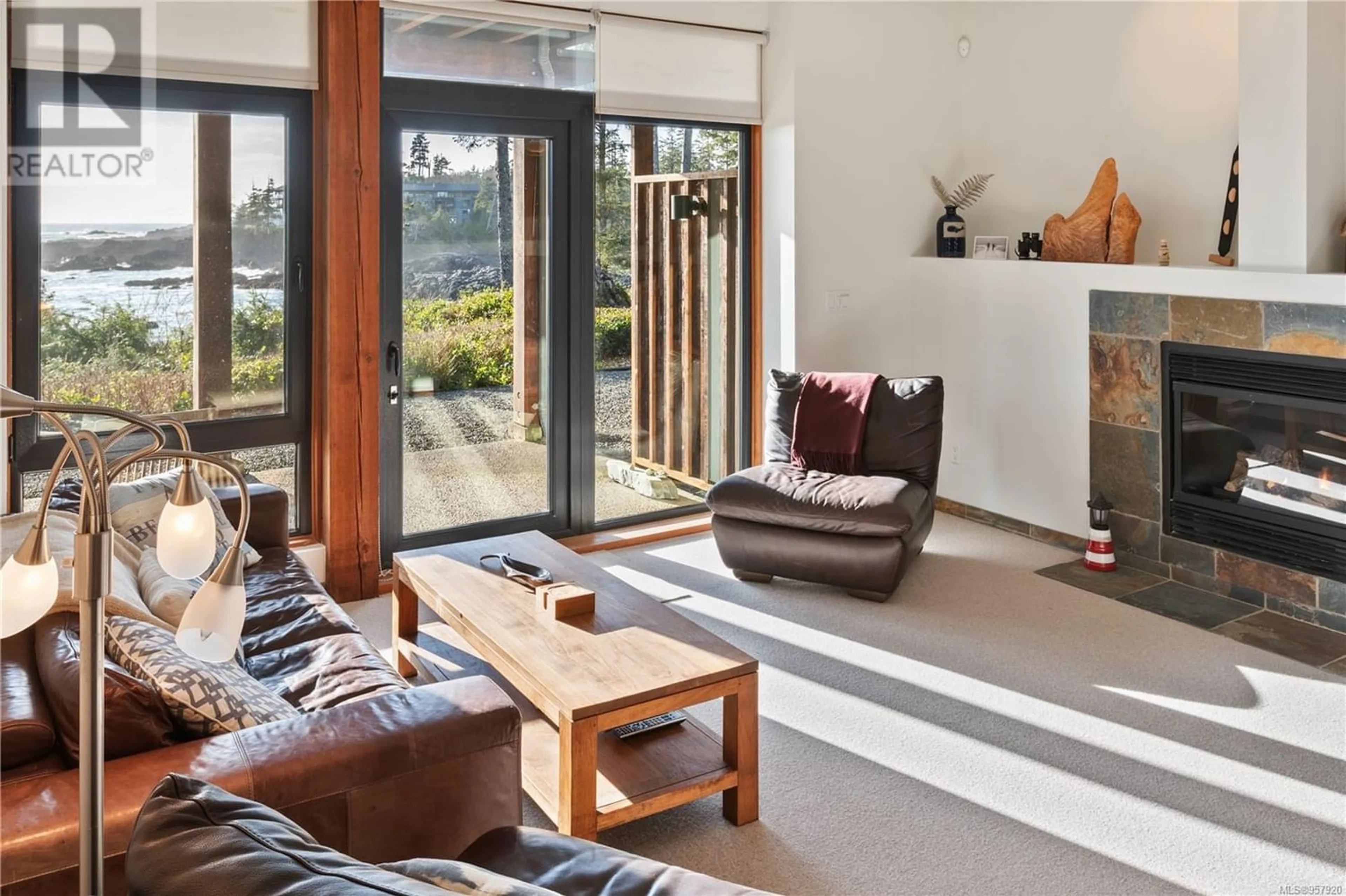 Living room with furniture, cement floor for 106 554 Marine Dr, Ucluelet British Columbia V0R3A0