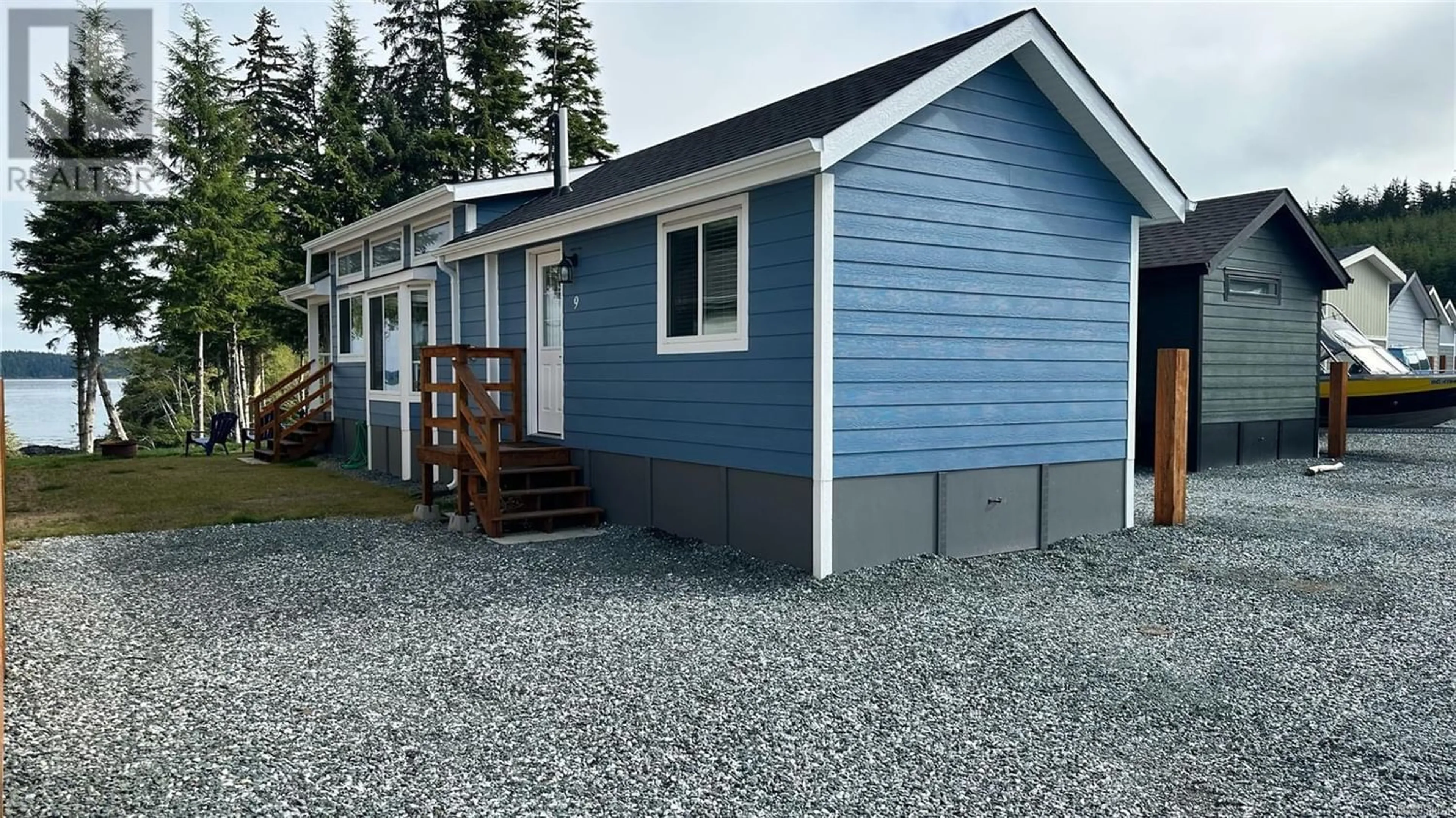 Home with vinyl exterior material for 9 1 Alder Bay Rd, Port McNeill British Columbia V0N2R0