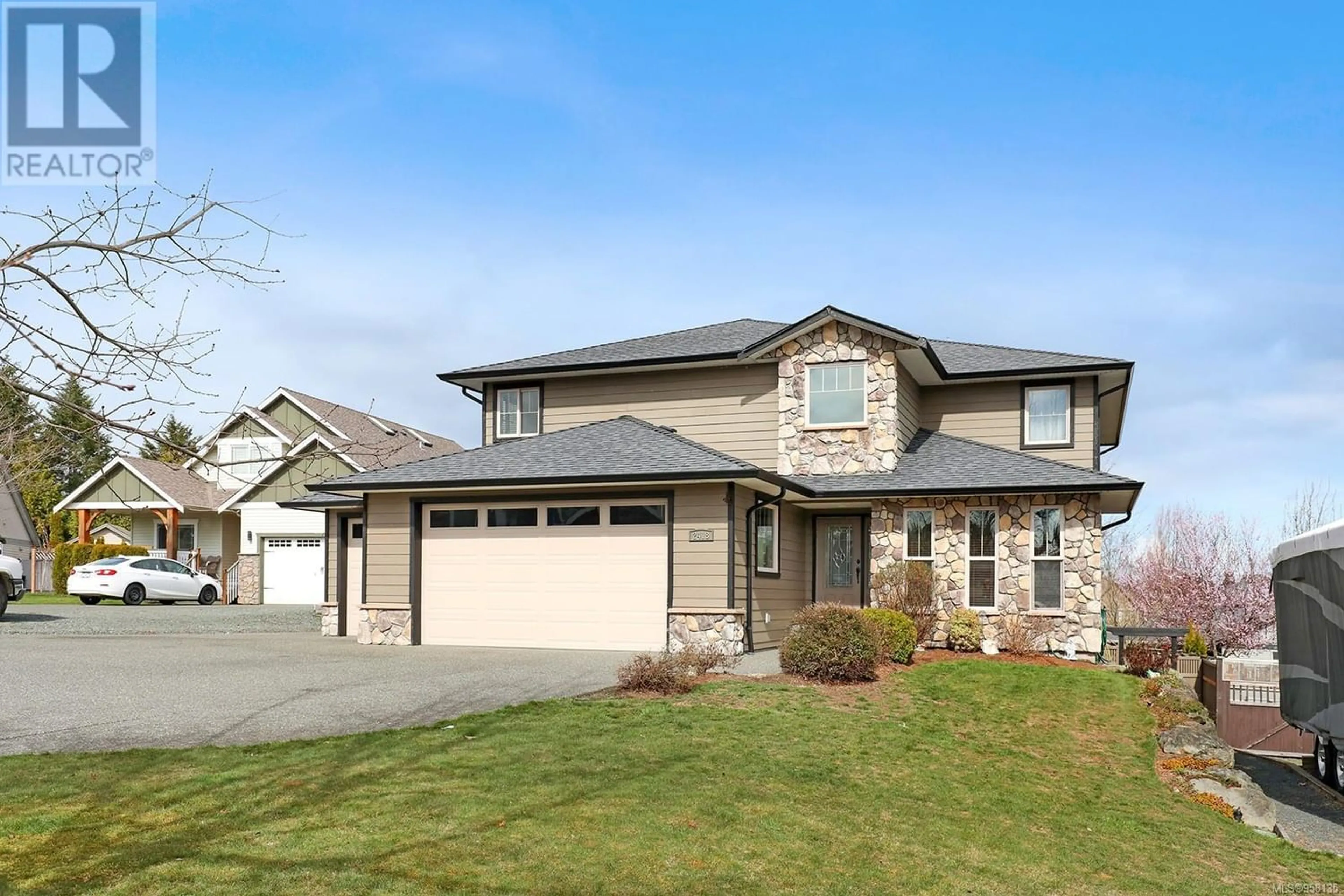 Frontside or backside of a home for 2418 Silver Star Pl, Comox British Columbia V9M4A8
