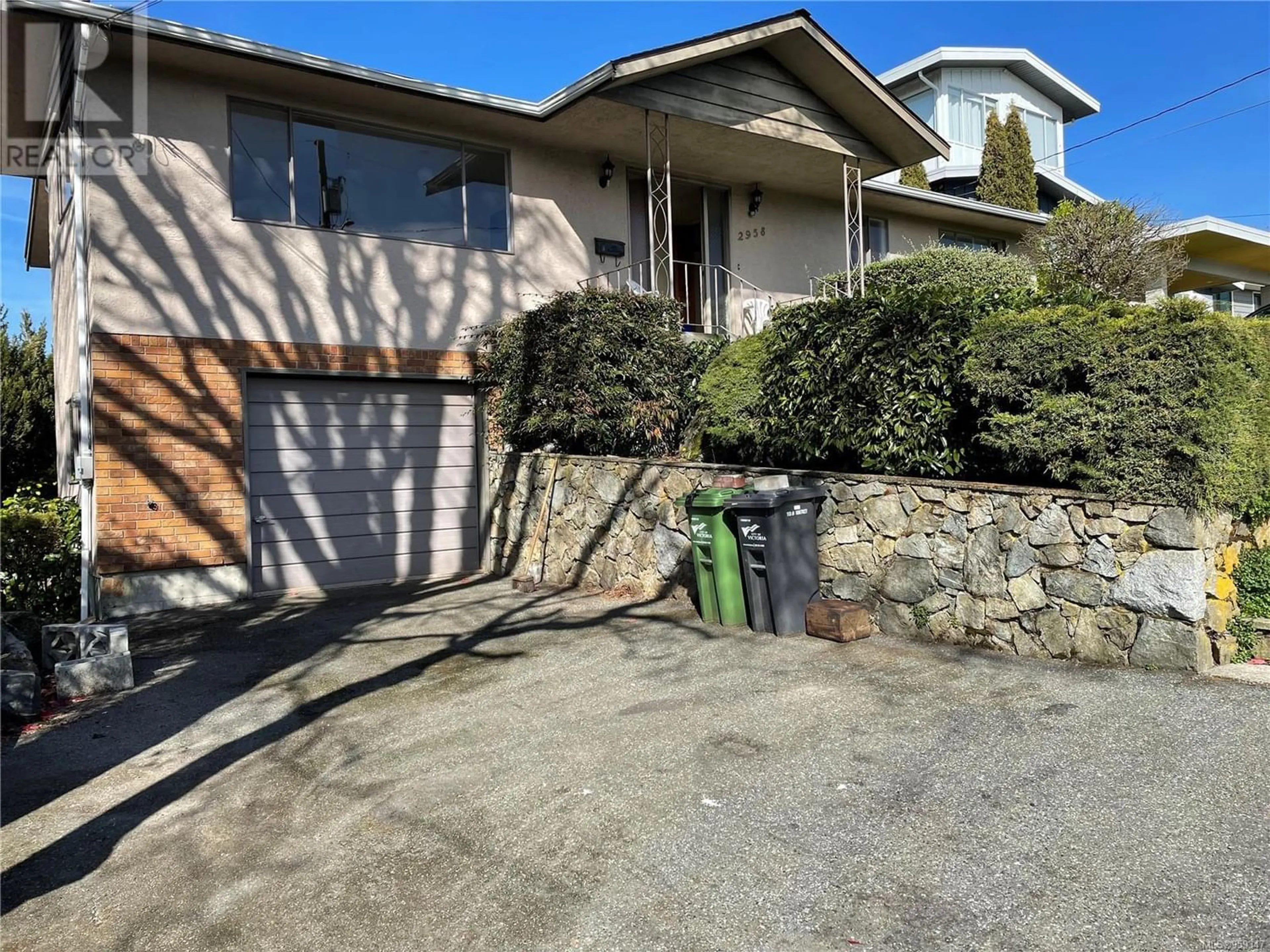 Frontside or backside of a home for 2958 Irma St, Saanich British Columbia V9A1S4