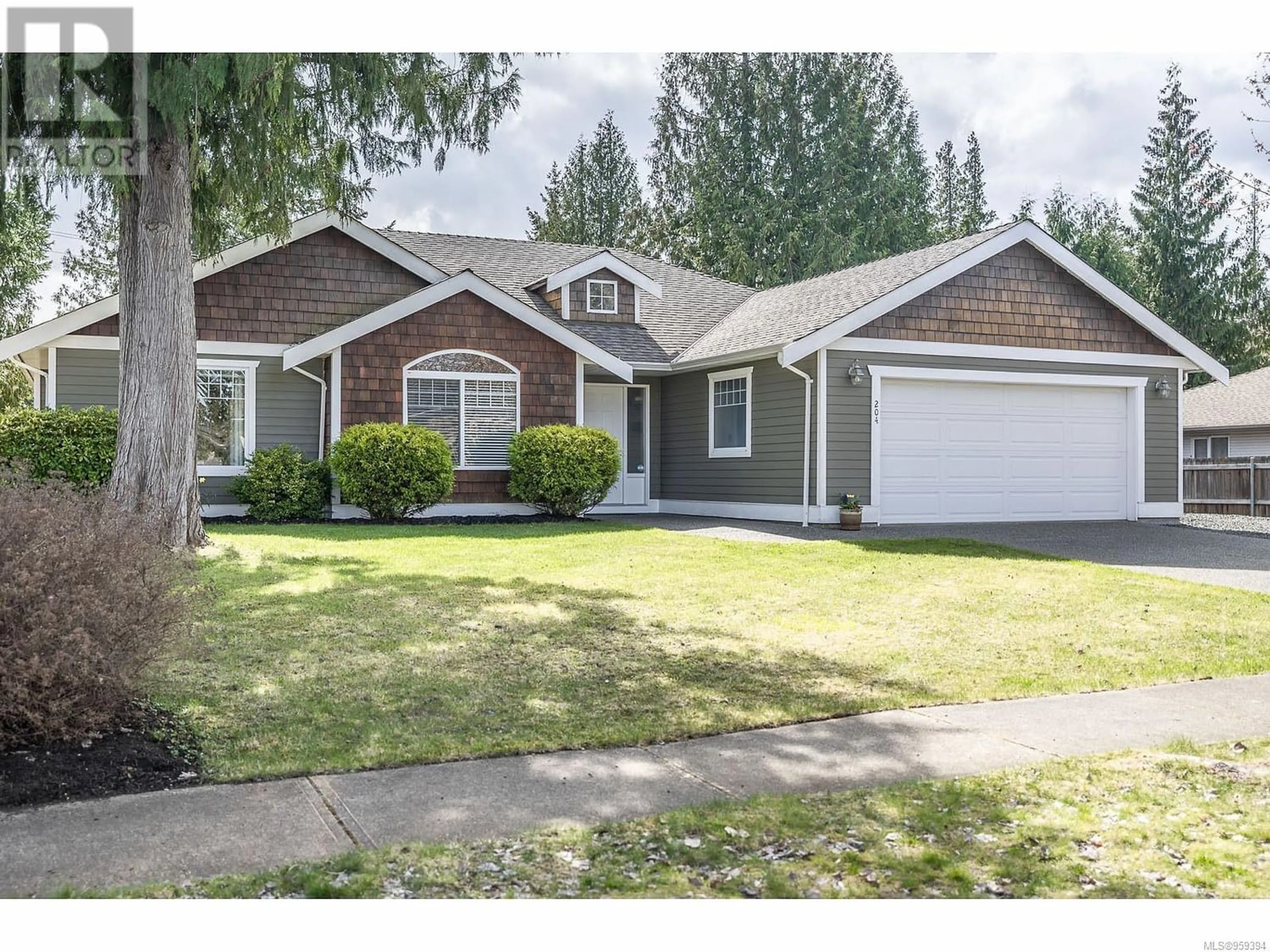 Frontside or backside of a home for 204 SATURNA Dr, Qualicum Beach British Columbia V9K2P5
