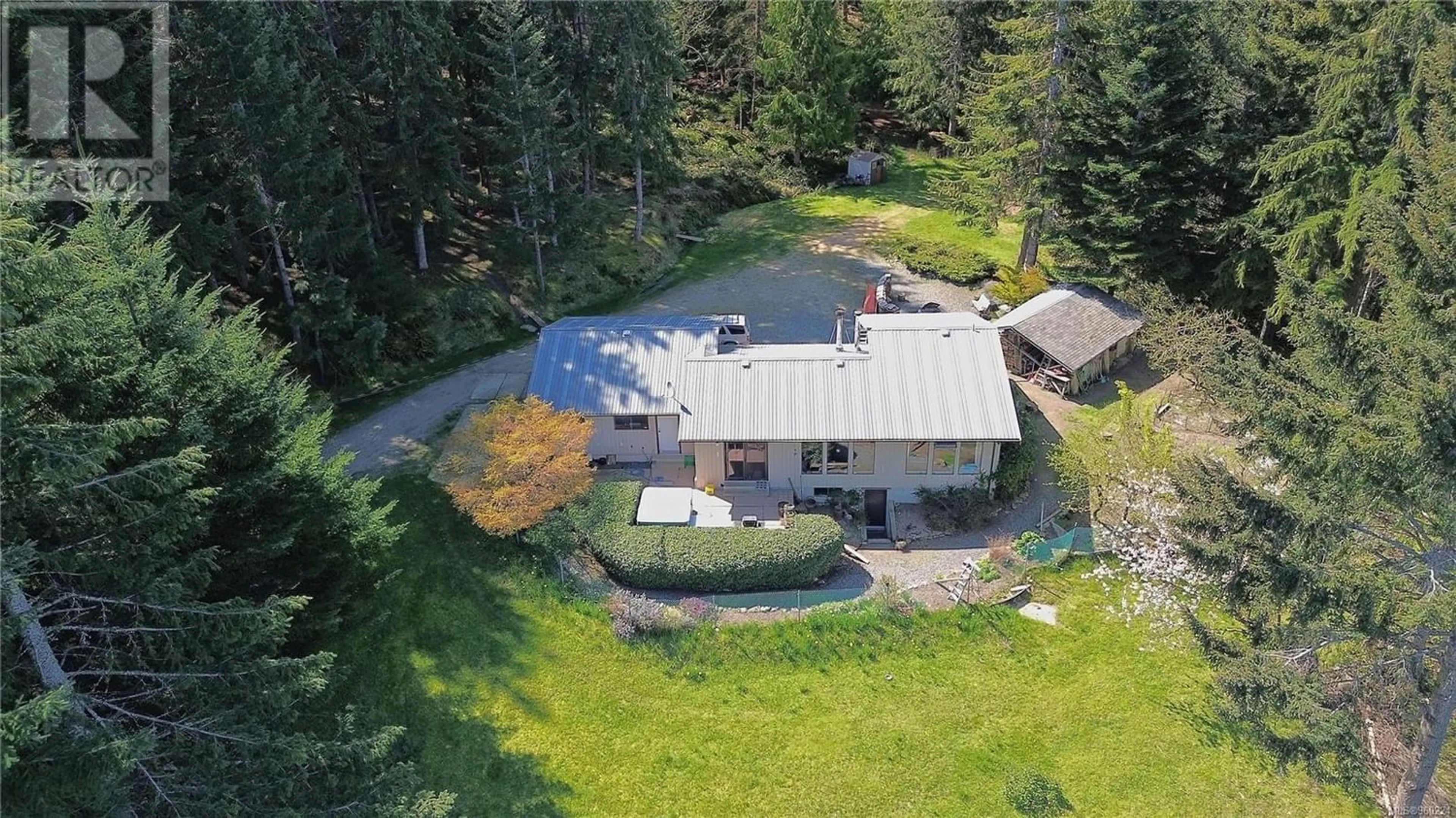 A pic from outside/outdoor area/front of a property/back of a property/a pic from drone, unknown for 444 Blackburn Rd, Salt Spring British Columbia V8K2H2