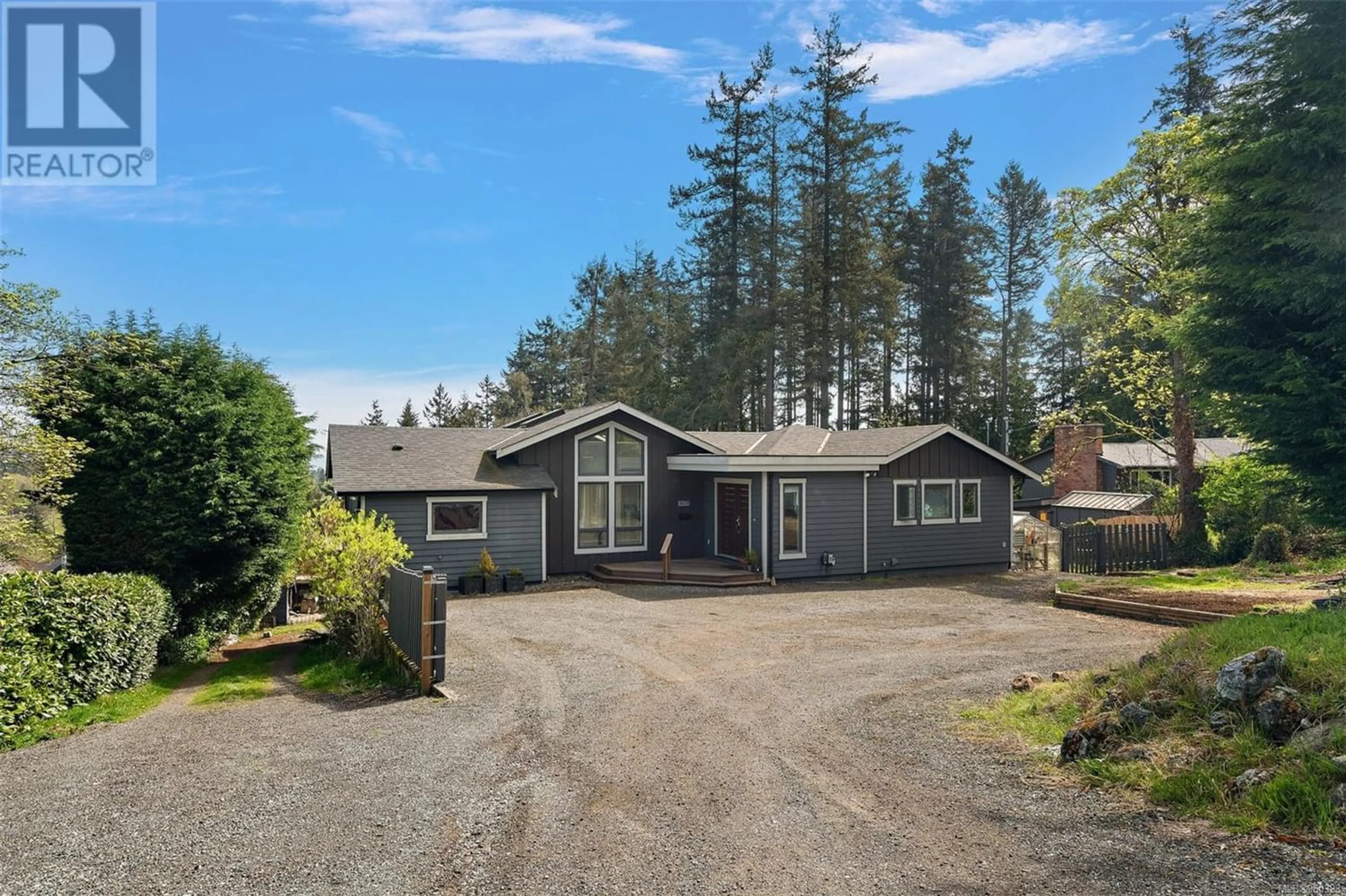 Frontside or backside of a home for 5675 Wellsview Rd, Saanich British Columbia V8Y1V4