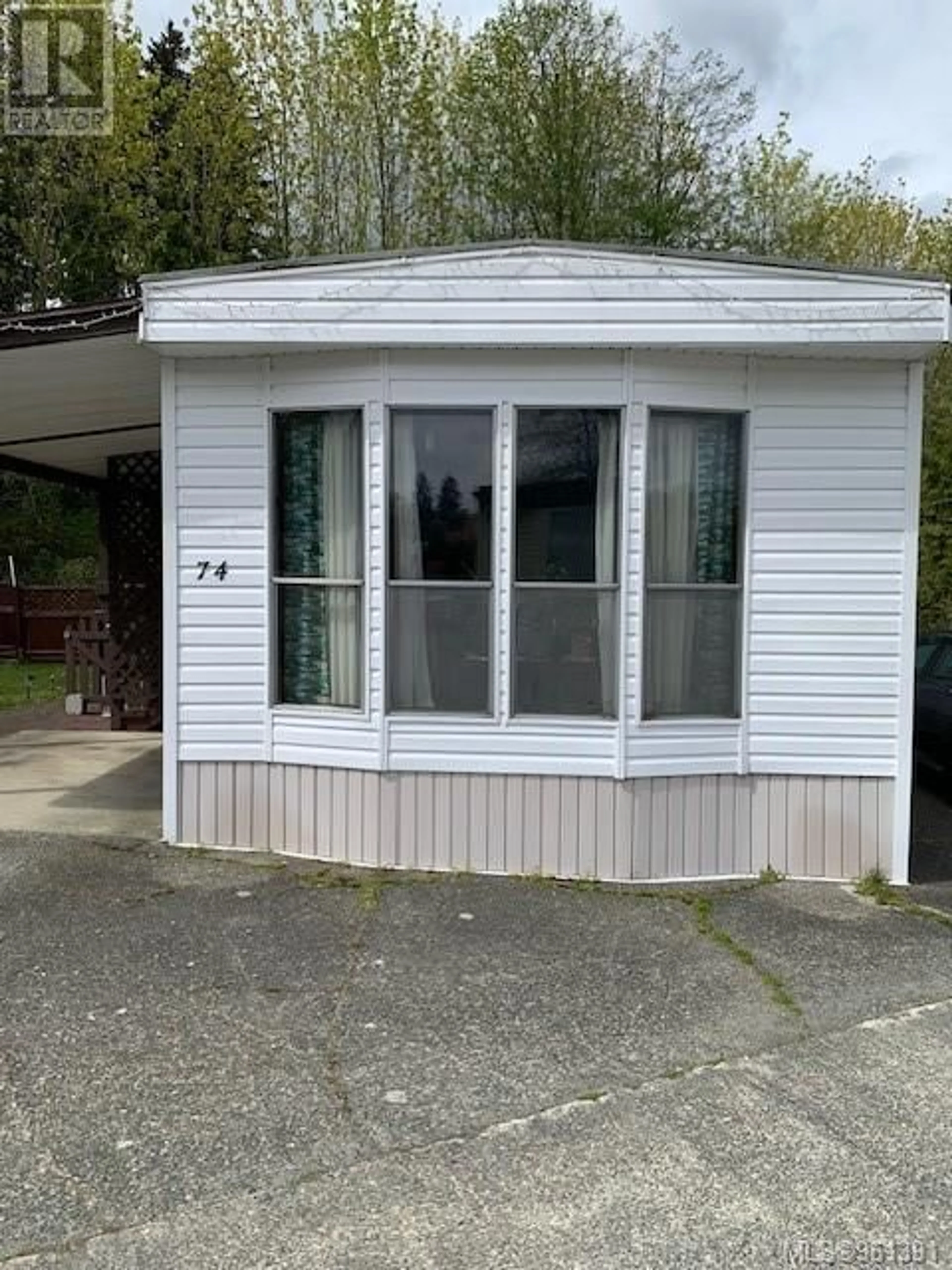 Home with vinyl exterior material for 74 951 Homewood Rd, Campbell River British Columbia V9W3N7