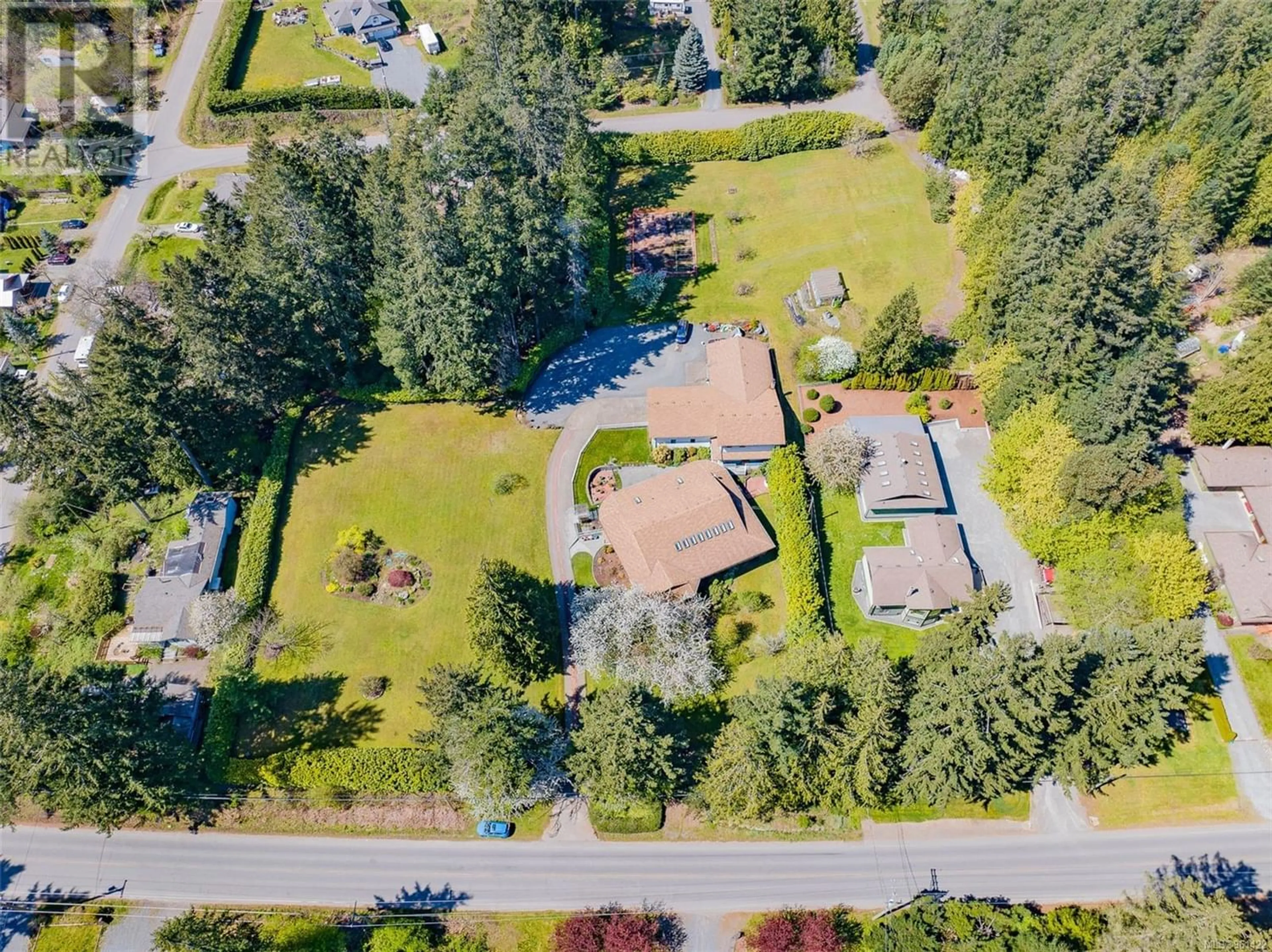 Frontside or backside of a home, the street view for 2369 South Wellington Rd, Nanaimo British Columbia V9X1S4