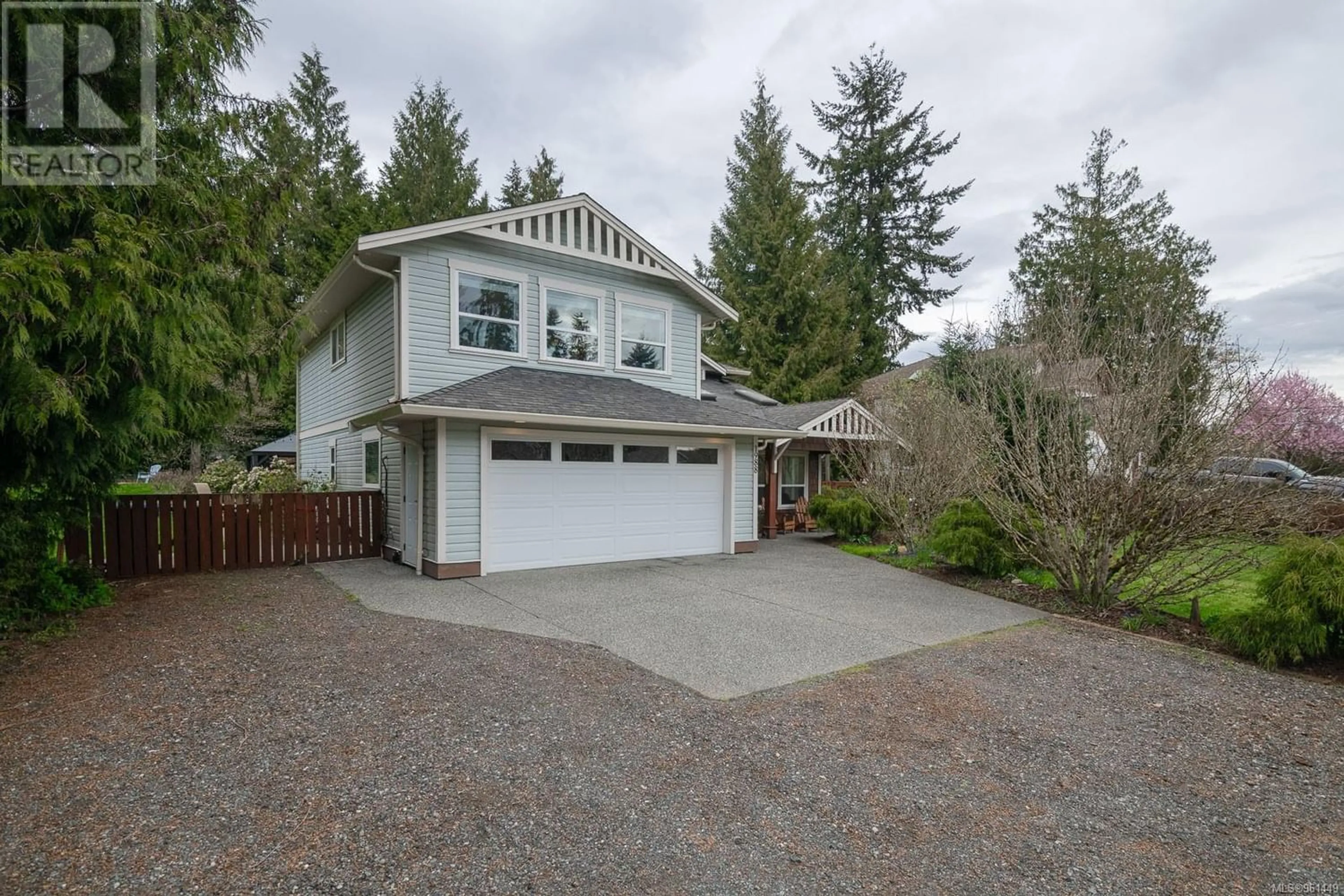 Frontside or backside of a home for 1988 Woodridge Rd, Nanaimo British Columbia V9X1M2
