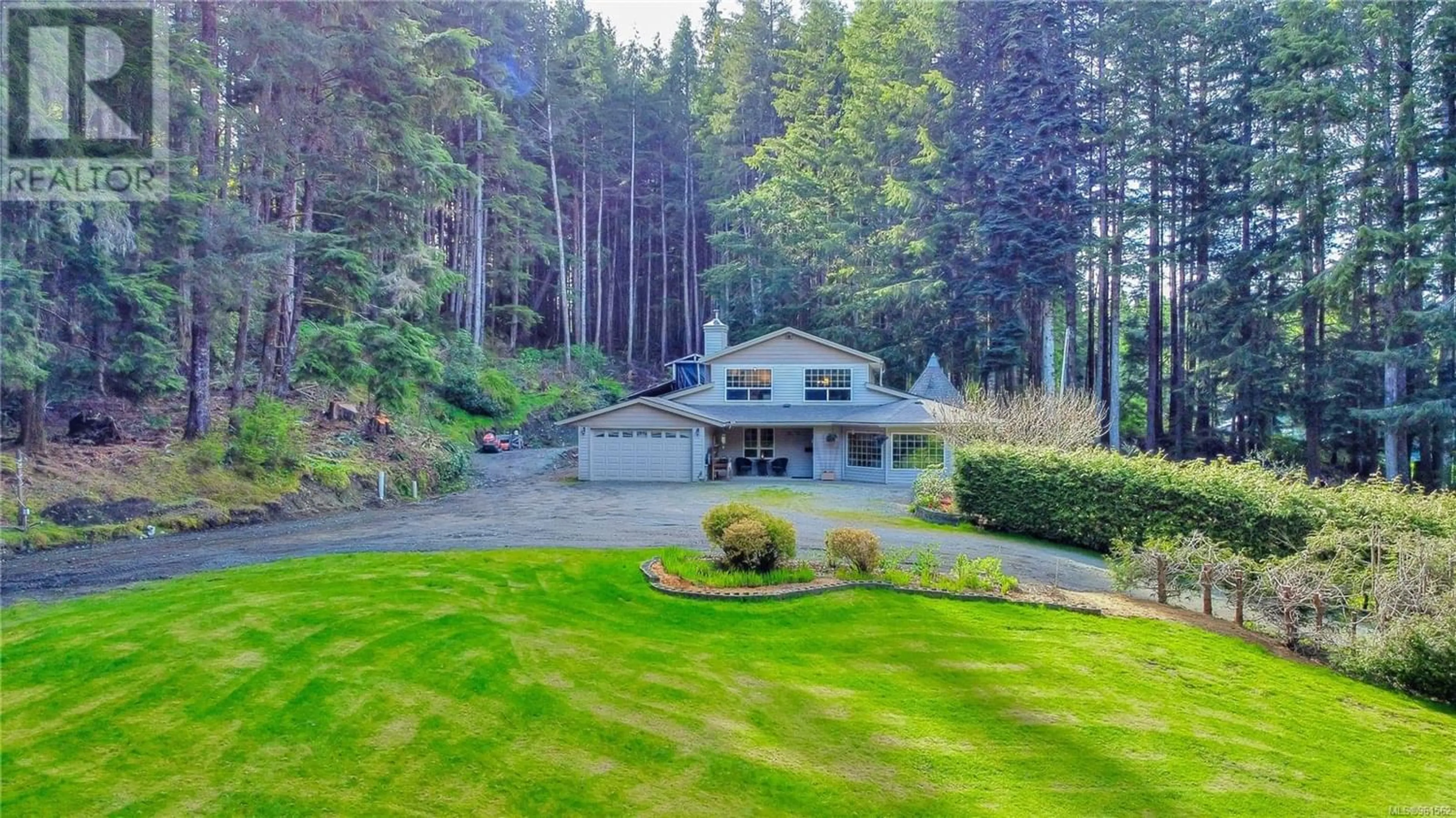 A pic from exterior of the house or condo for 701 Nimpkish Heights Rd, Hyde Creek British Columbia V0N2R0