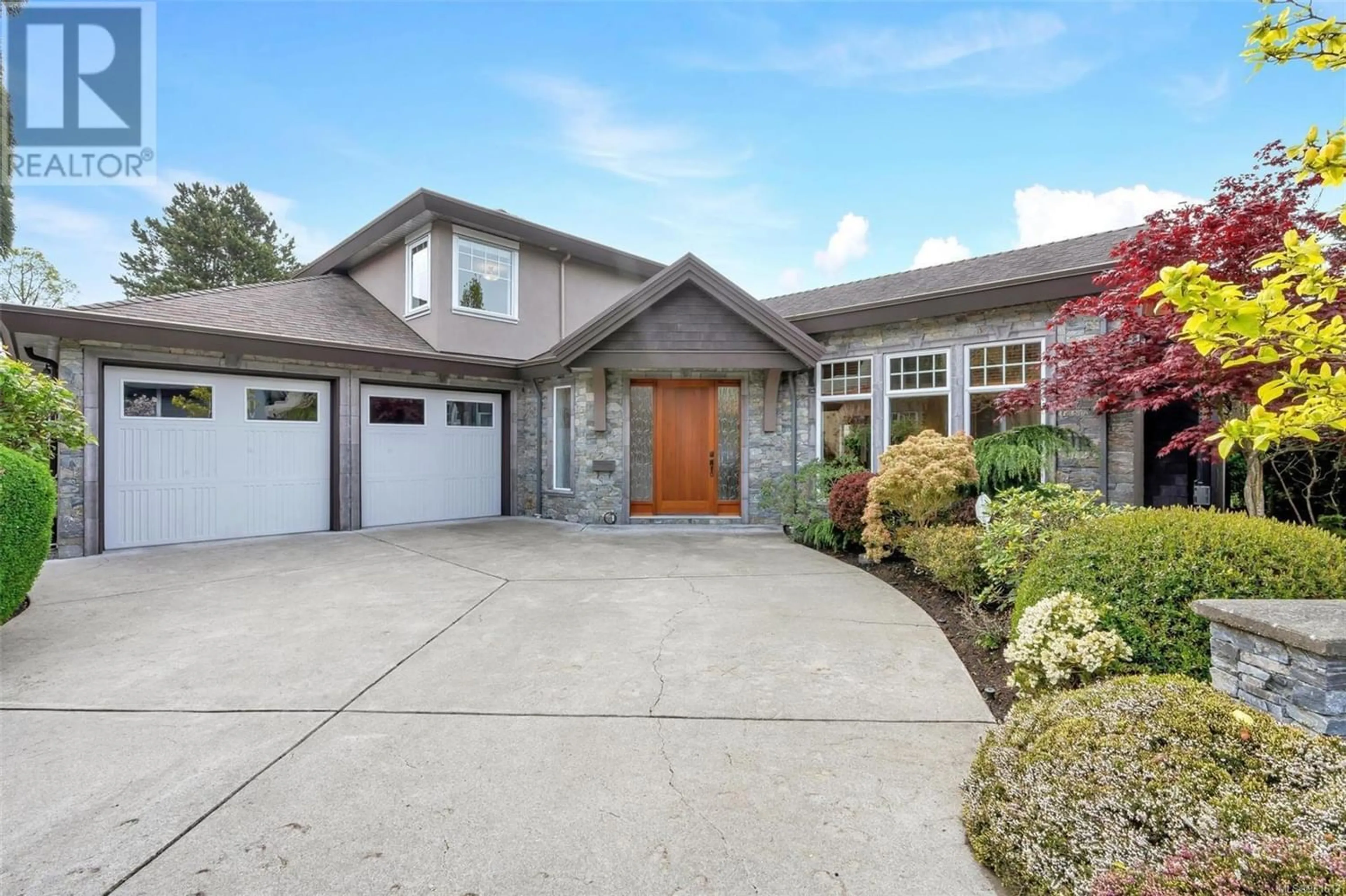 Frontside or backside of a home for 1705 De Sousa Pl, Saanich British Columbia V8N3L3