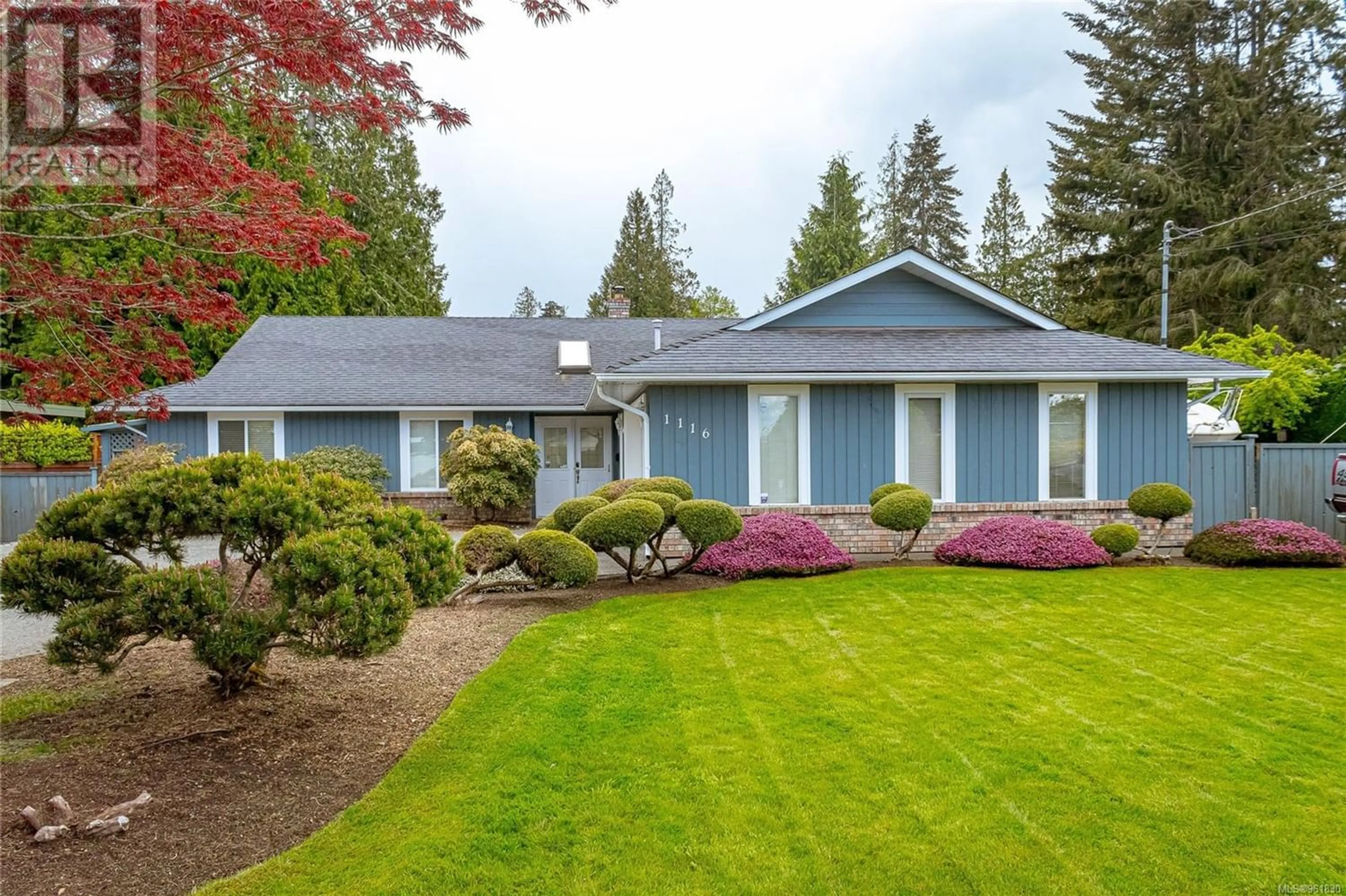 Home with vinyl exterior material for 1116 Pintail Dr, Qualicum Beach British Columbia V9K1C8