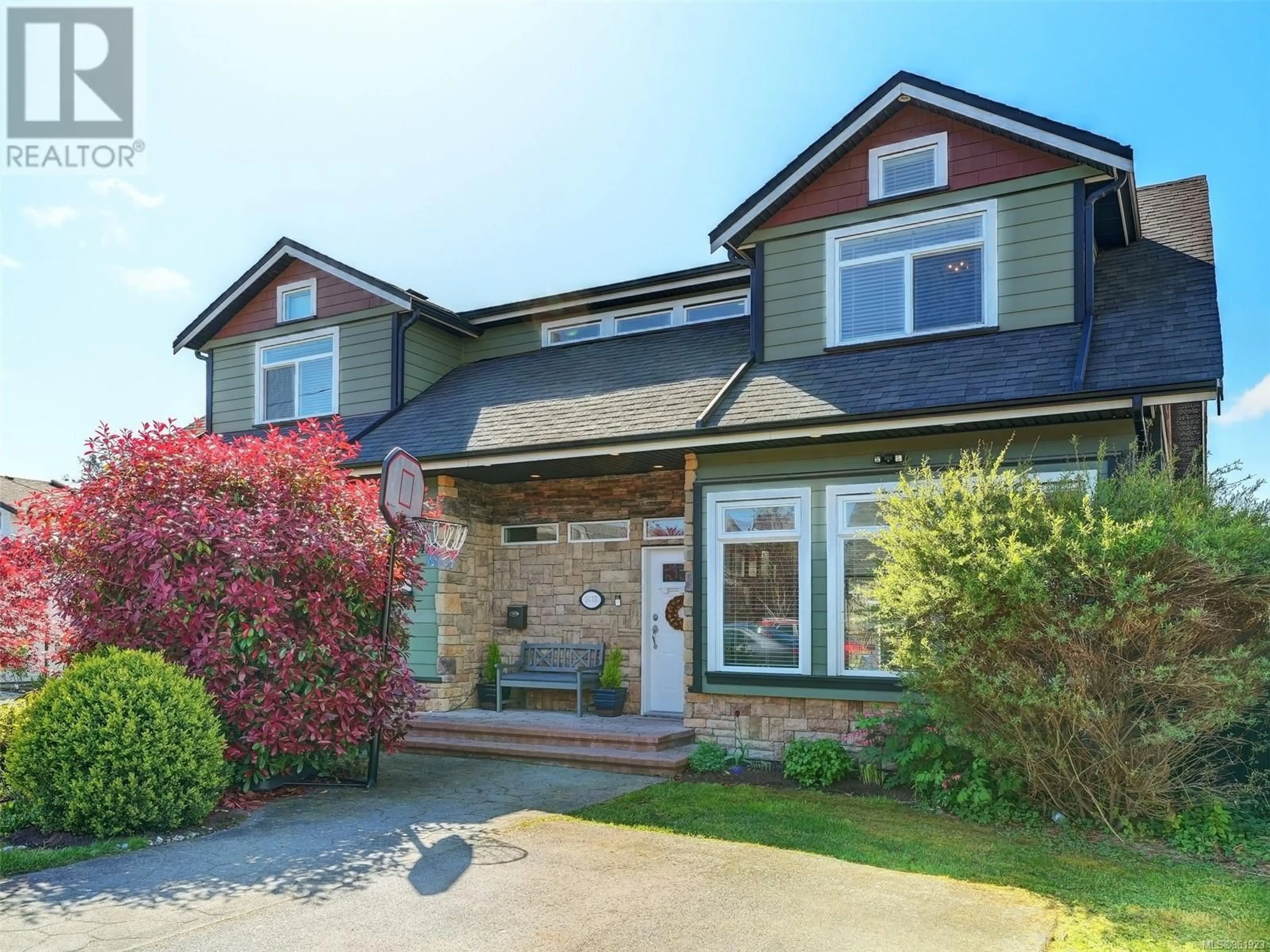 Frontside or backside of a home for 2477 Orchard Ave, Sidney British Columbia V8L1V4