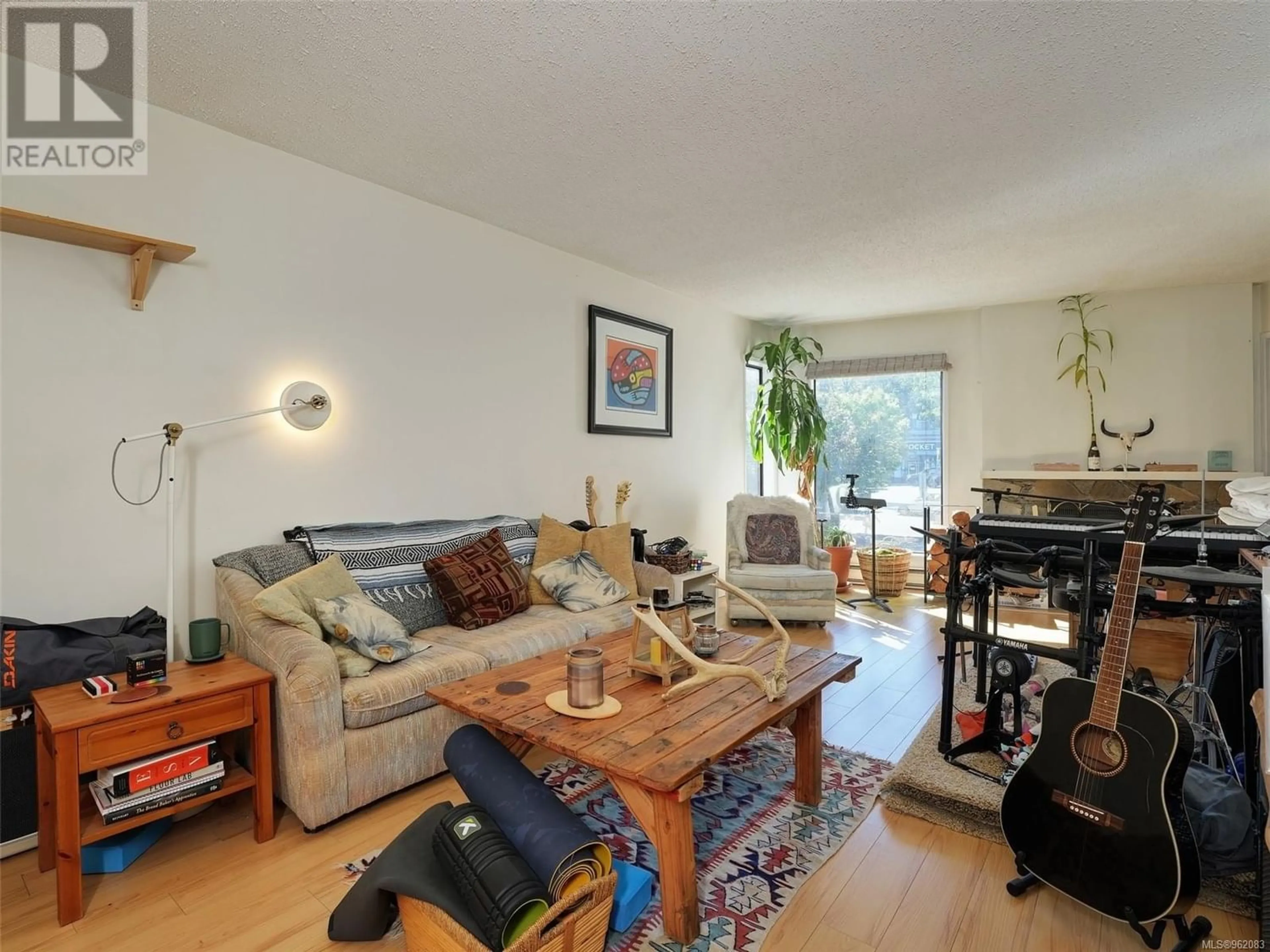 Living room for 105 1518 Pandora Ave, Victoria British Columbia V8R1A8