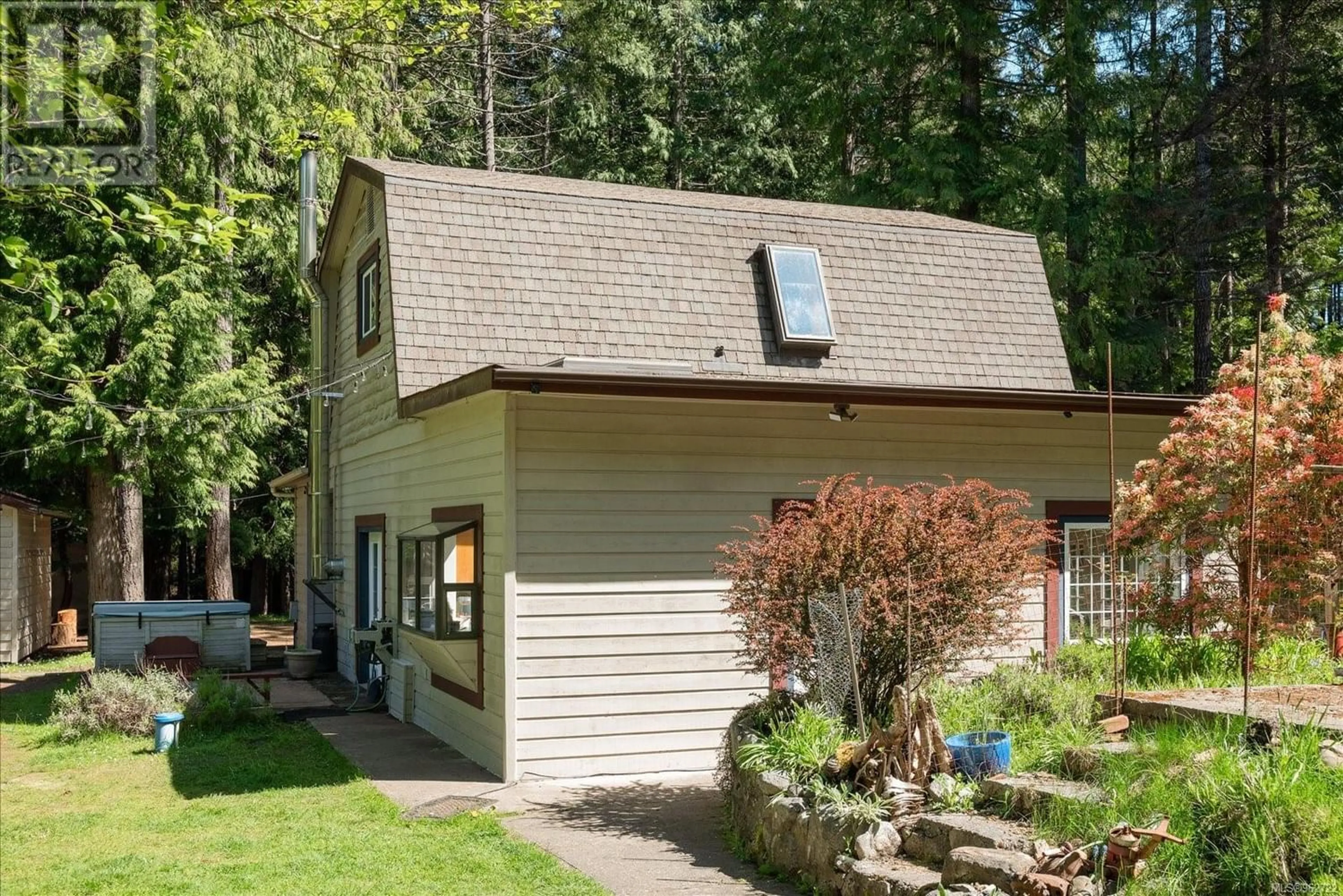 Frontside or backside of a home, the fenced backyard for 1650 Hess Rd, Gabriola Island British Columbia V0R1X6